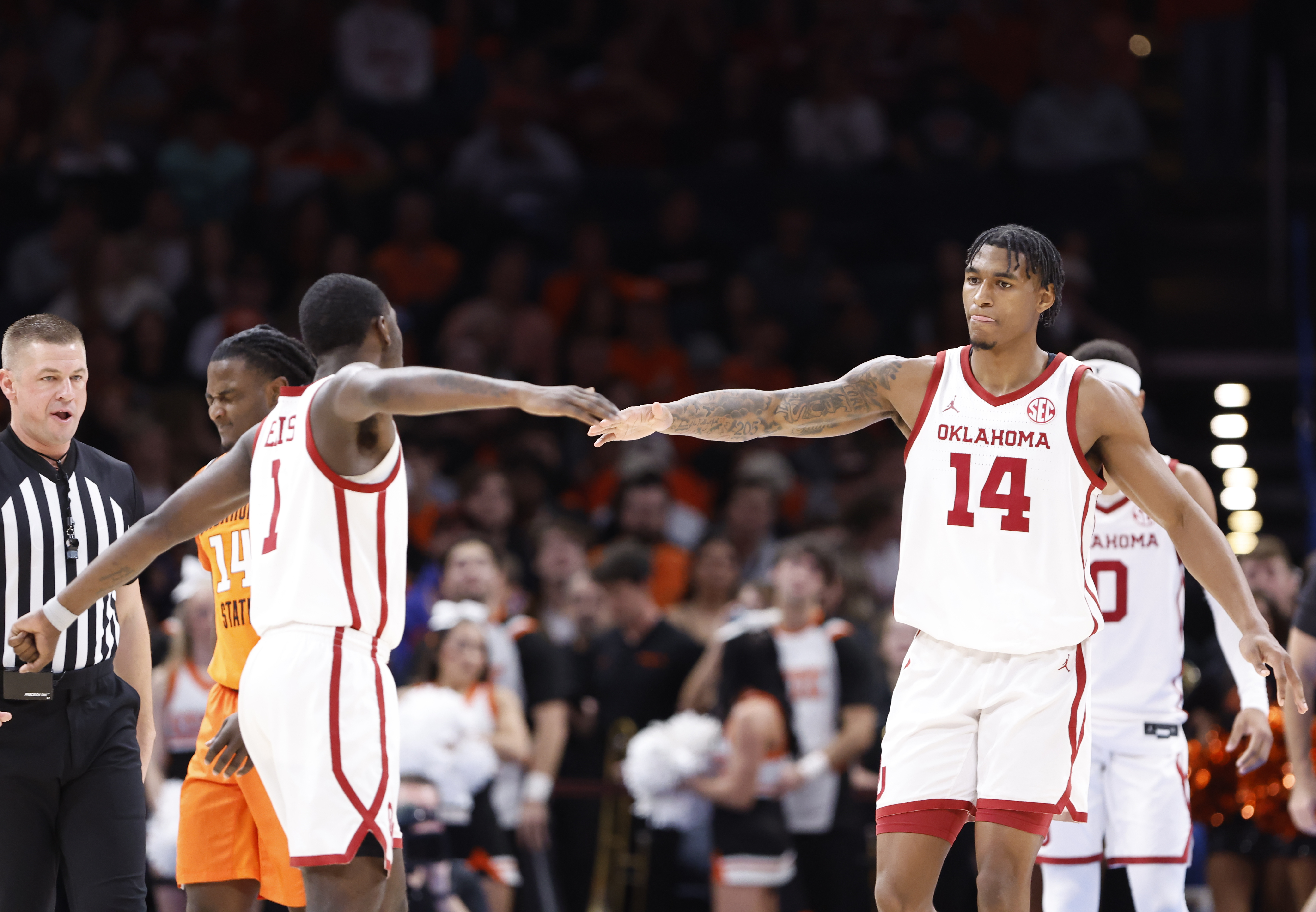 Godwin scores career-high 20 points, No. 13 Oklahoma beats in-state rival Oklahoma State 80-65