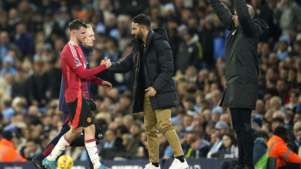 Manchester United's Mason Mount goes off injured during the English Premier League soccer match between Manchester City and Manchester United at the Etihad Stadium in Manchester, Sunday, Dec. 15, 2024.