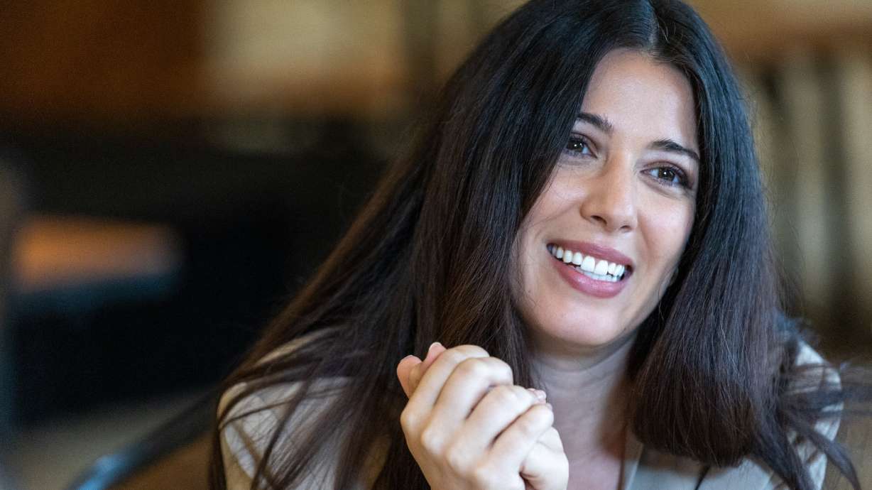 Elizabeth Tabish, who plays Mary Magdalene in "The Chosen," talks to members of the media at the Salvation Army's Camp Hoblitzelle in Midlothian, Texas, on Aug. 15.
