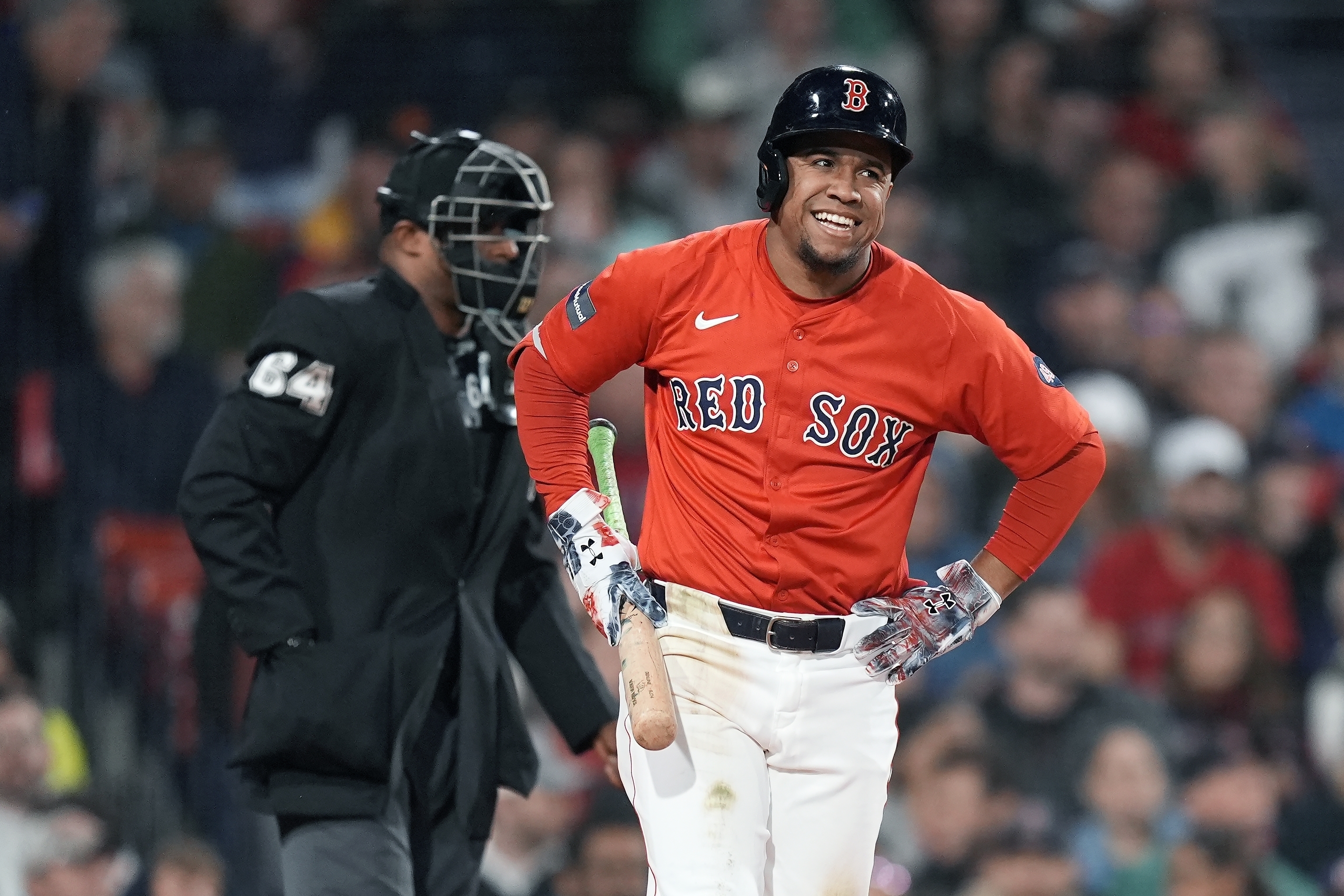 FILE - Boston Red Sox's Enmanuel Valdez reacts after being called out on strikes during the sixth inning of a baseball game against the Minnesota Twins, Sept. 20, 2024, in Boston.