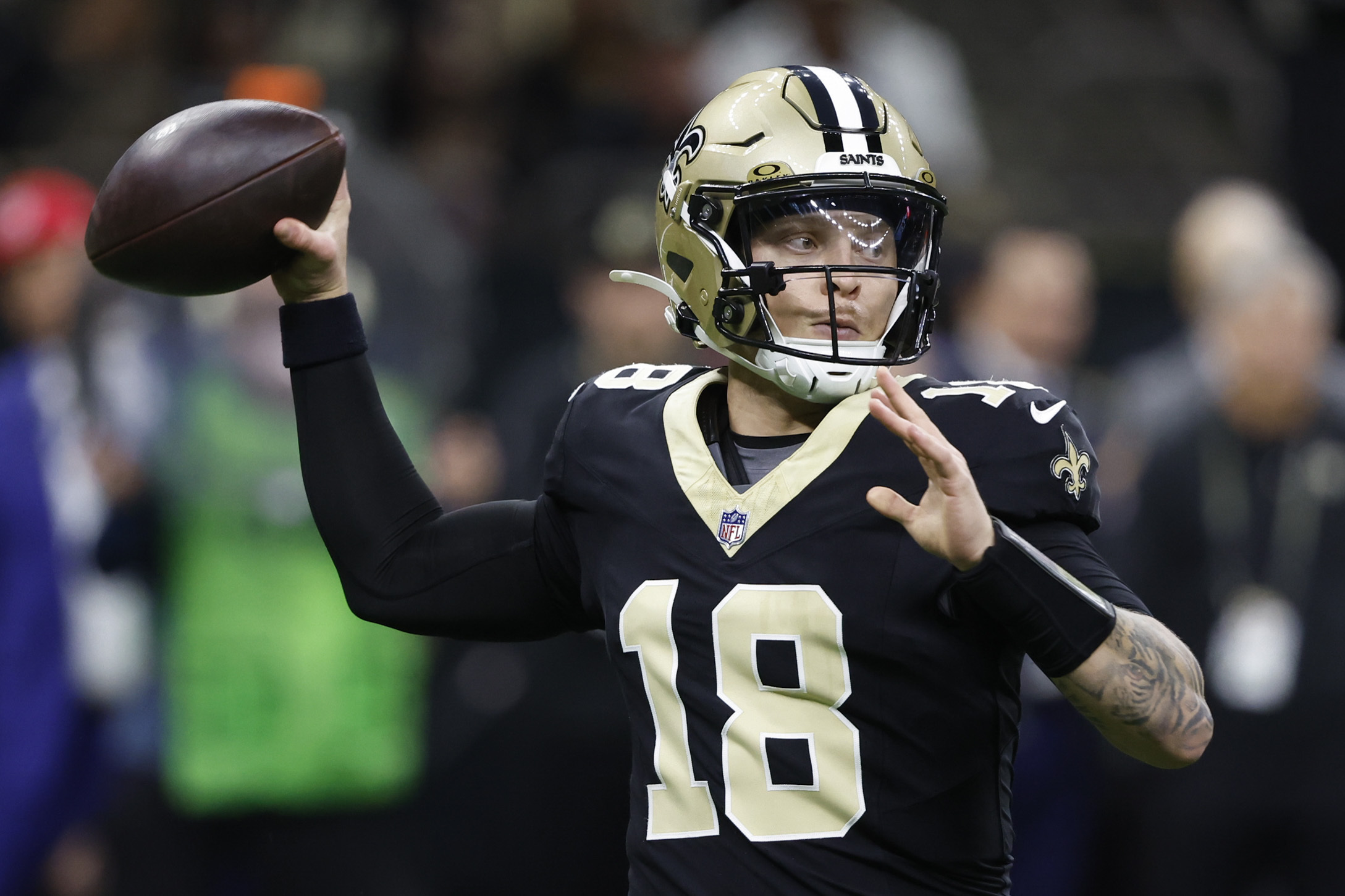 New Orleans Saints quarterback Spencer Rattler (18) throws a pass in the second half of an NFL football game against the Washington Commanders in New Orleans, Sunday, Dec. 15, 2024. 
