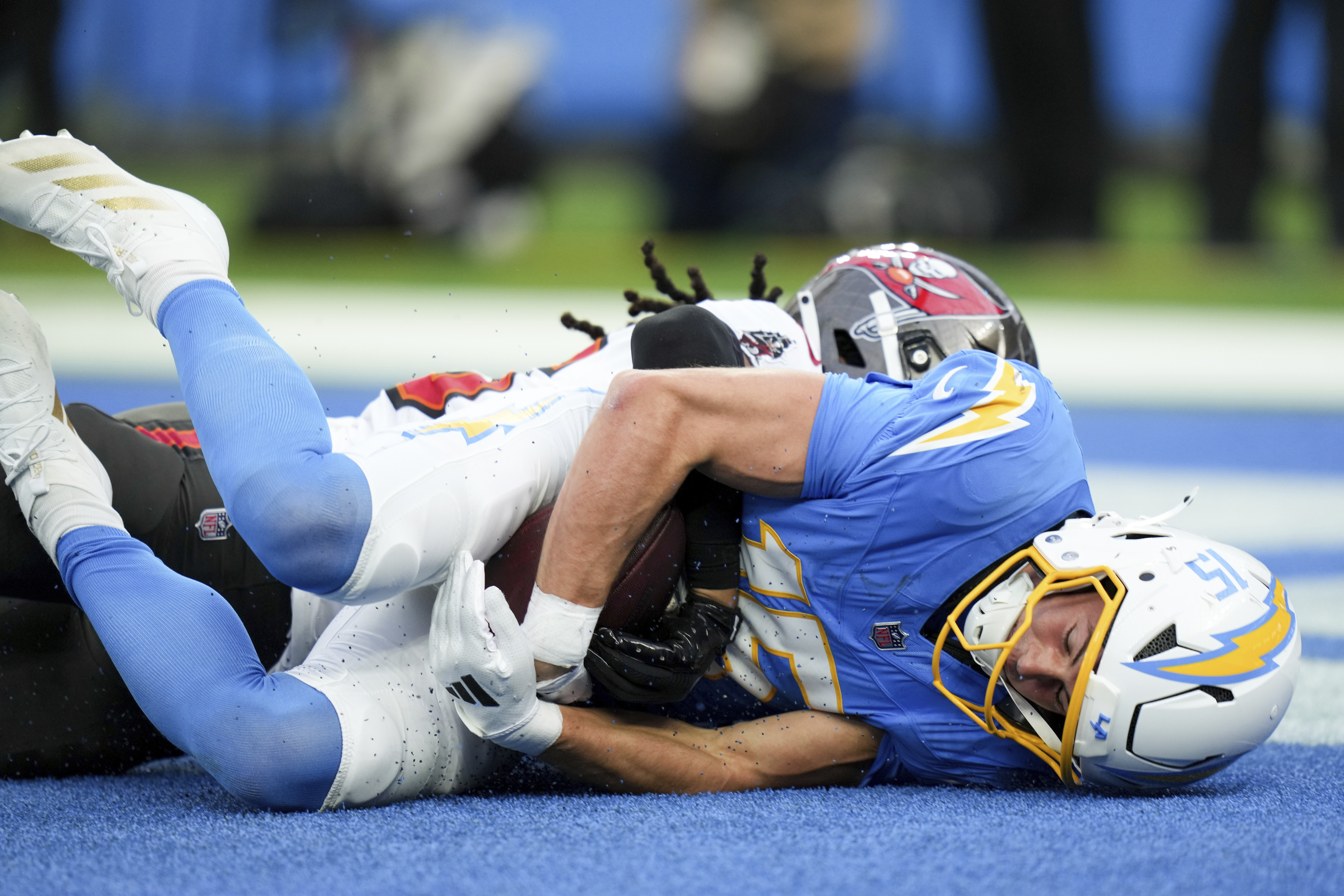 Los Angeles Chargers wide receiver Ladd McConkey (15) makes a touchdown catch during the first half of an NFL football game against the Tampa Bay Buccaneers Sunday, Dec. 15, 2024, in Inglewood, Calif. 