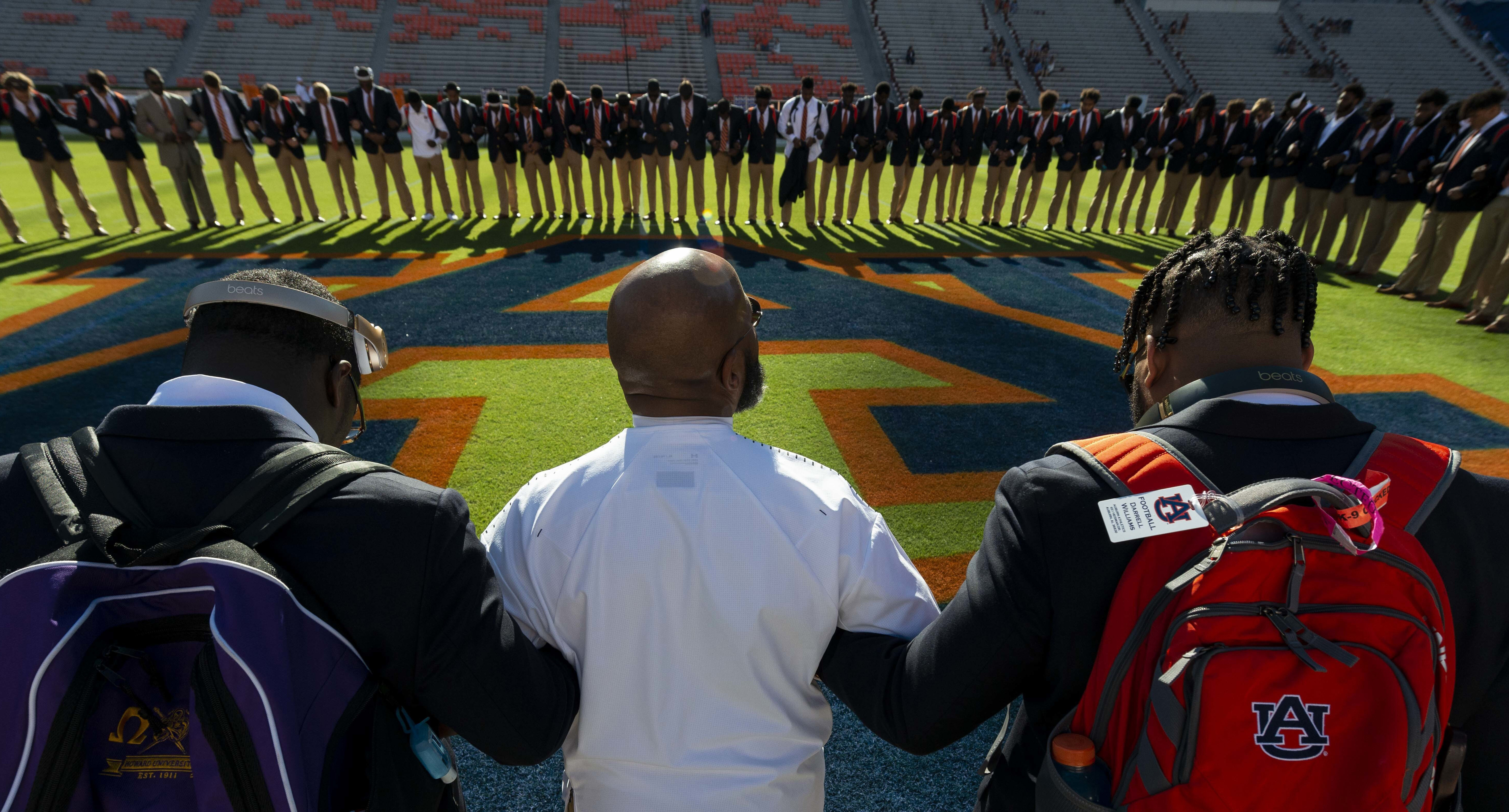 FILE - Auburn's chaplain Chette Williams leads the Tigers in prayer before an NCAA college football game against Tennessee, Oct. 13, 2018, in Auburn, Ala. 