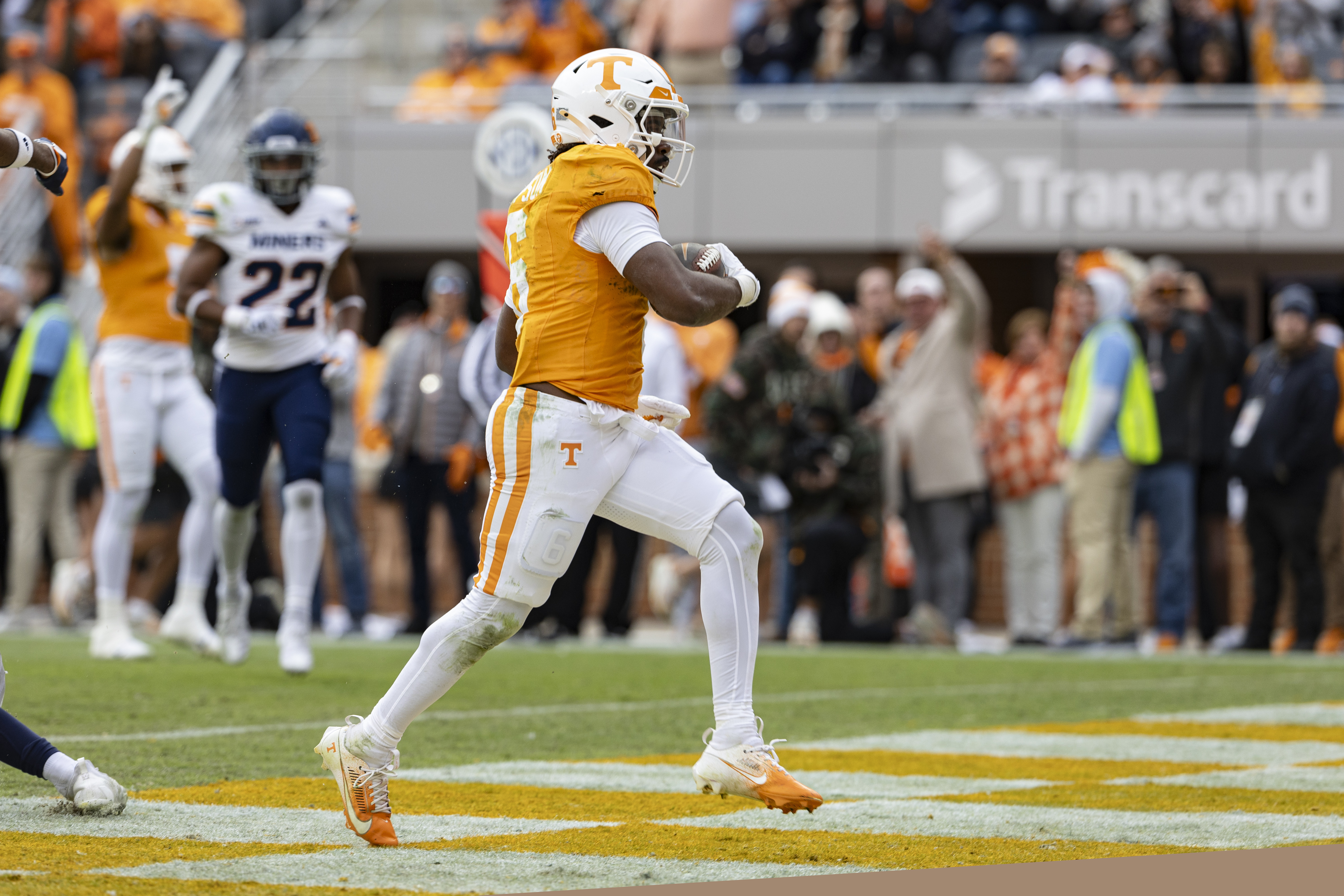 Tennessee running back Dylan Sampson (6) crosses the goal line for a touchdown during the first half of an NCAA college football game against UTEP, Saturday, Nov. 23, 2024, in Knoxville, Tenn.