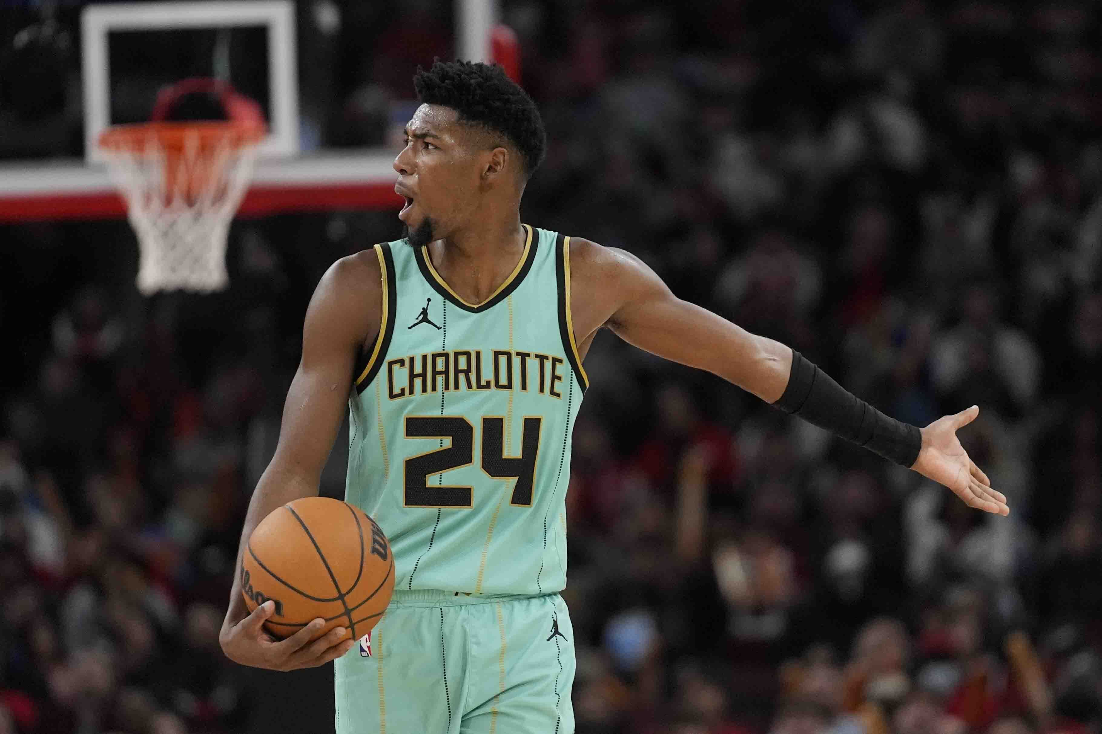 Charlotte Hornets forward Brandon Miller reacts after a call during the second half of an NBA basketball game against the Chicago Bulls, Friday, Dec. 13, 2024, in Chicago. 