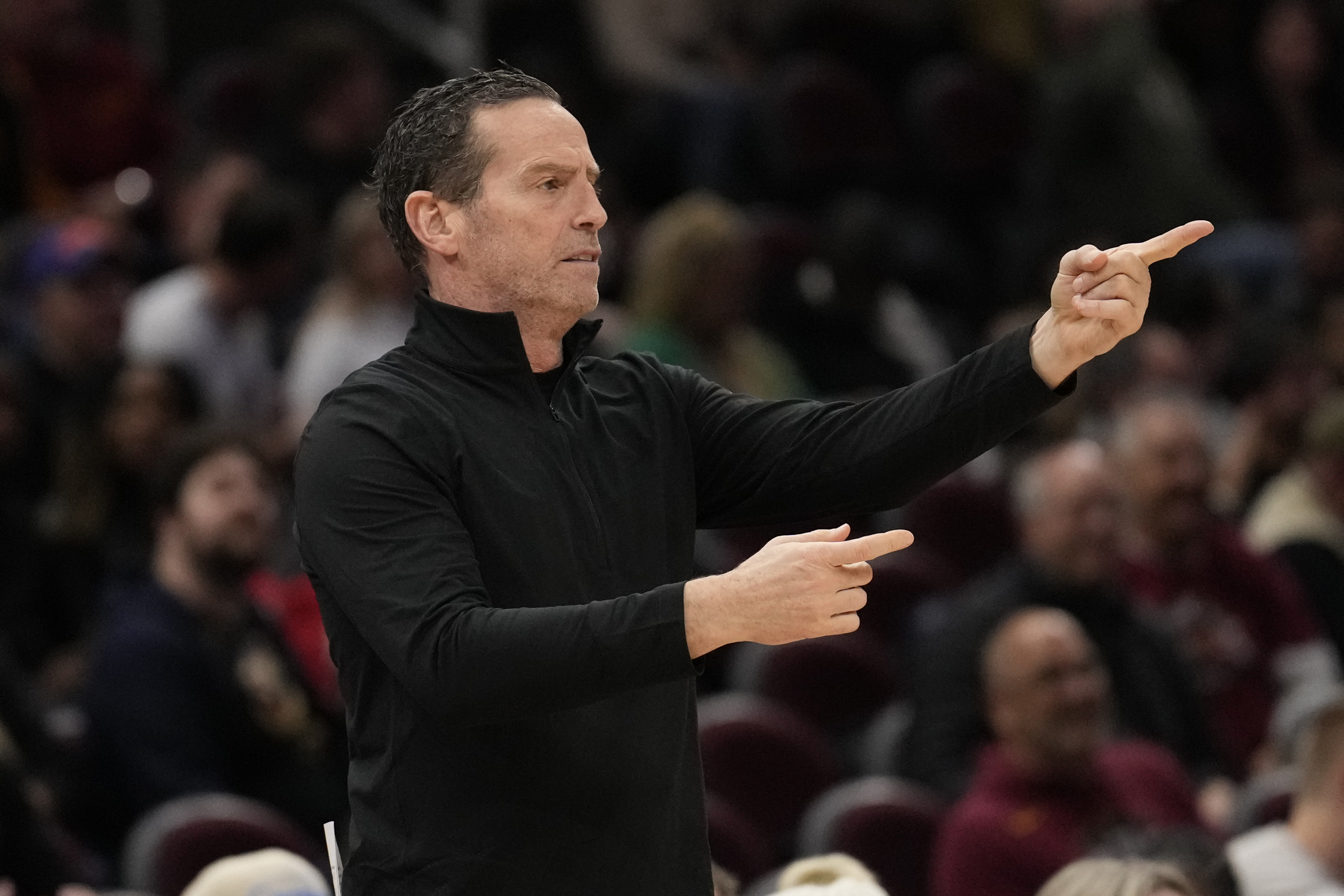 Cleveland Cavaliers head coach Kenny Atkinson gestures in the second half of an NBA basketball game against the Washington Wizards, Friday, Dec. 13, 2024, in Cleveland. 