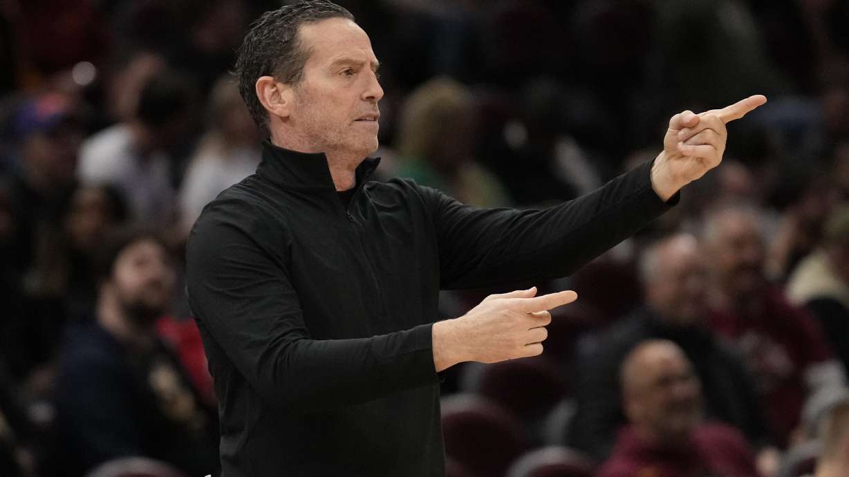Cleveland Cavaliers head coach Kenny Atkinson gestures in the second half of an NBA basketball game against the Washington Wizards, Friday, Dec. 13, 2024, in Cleveland.
