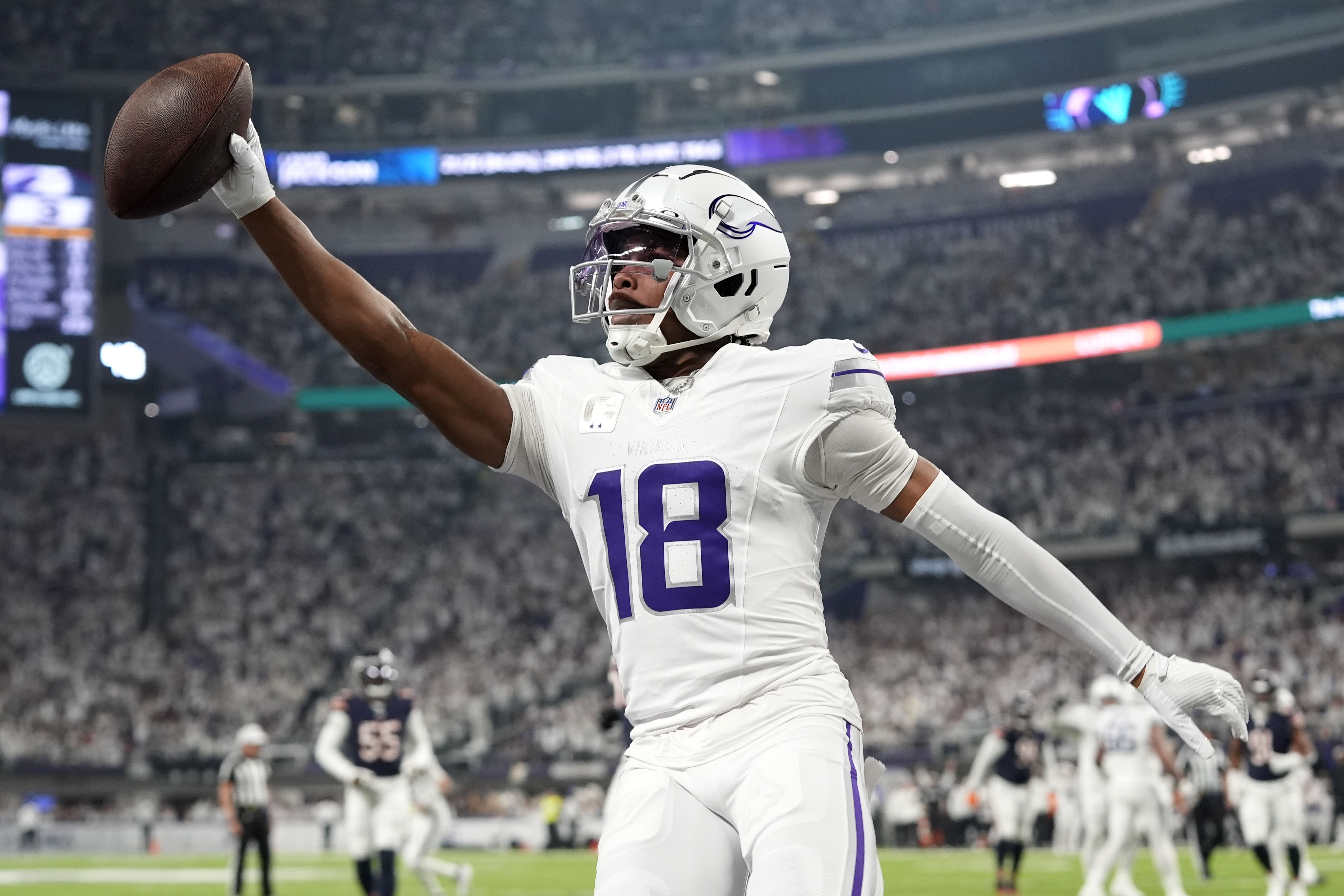Minnesota Vikings wide receiver Justin Jefferson celebrates after catching a 7-yard touchdown pass during the first half of an NFL football game against the Chicago Bears, Monday, Dec. 16, 2024, in Minneapolis.