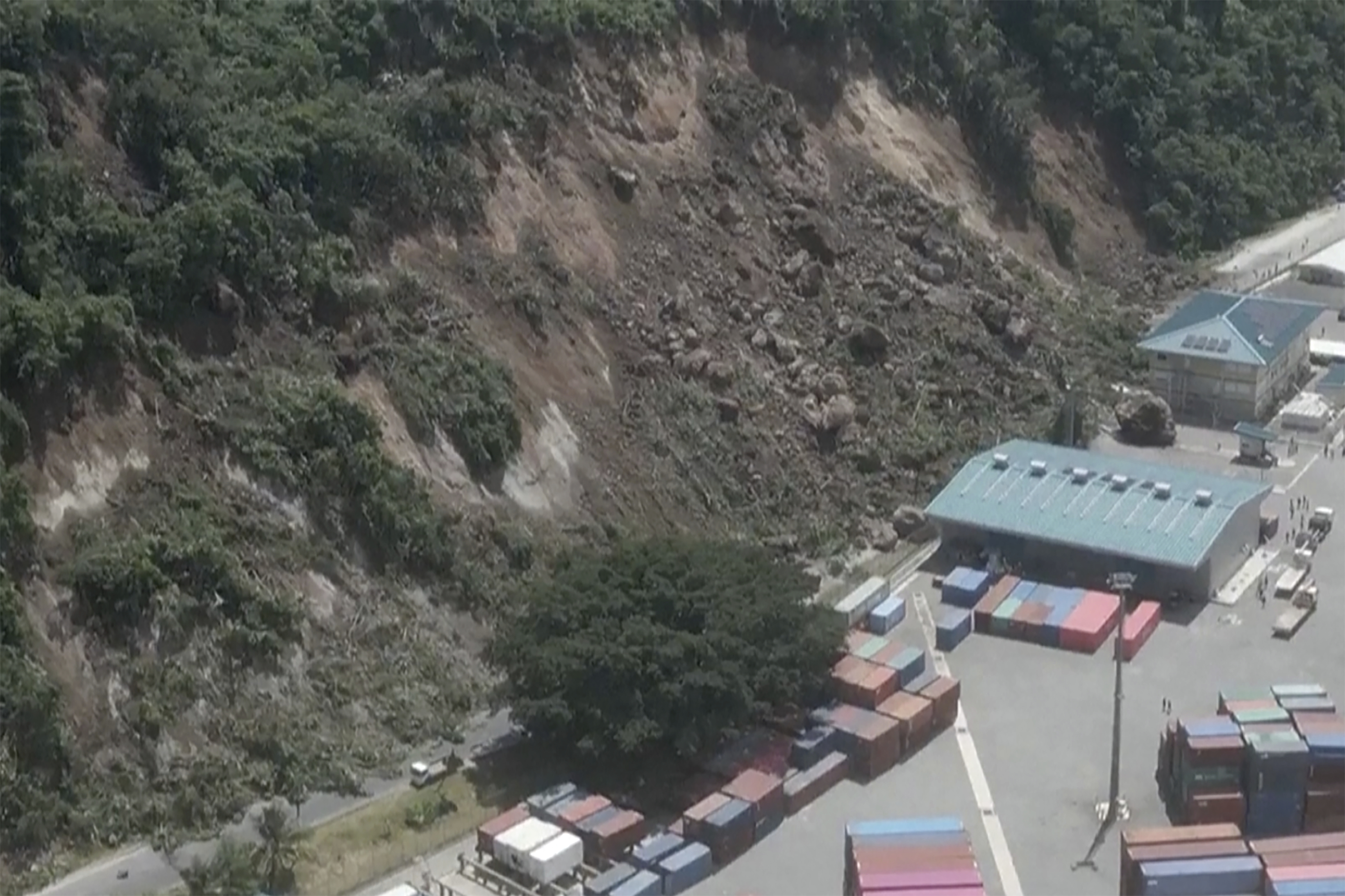 This image made from a video shows a landslide near an international shipping terminal in Port Vila, Vanuatu, following a powerful earthquake Tuesday.