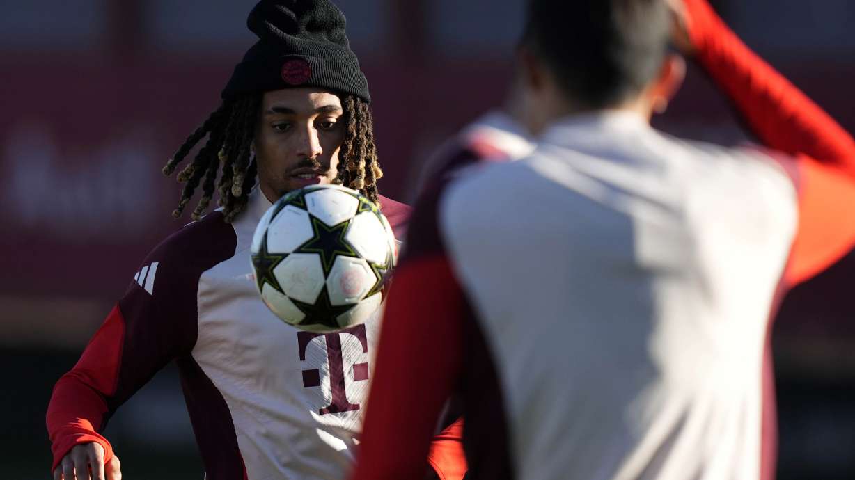 Bayern's Sacha Boey controls a ball during a training session in Munich, Germany, Monday, Nov. 25, 2024, ahead of the Champions League opening phase soccer match between FC Bayern and PSG.
