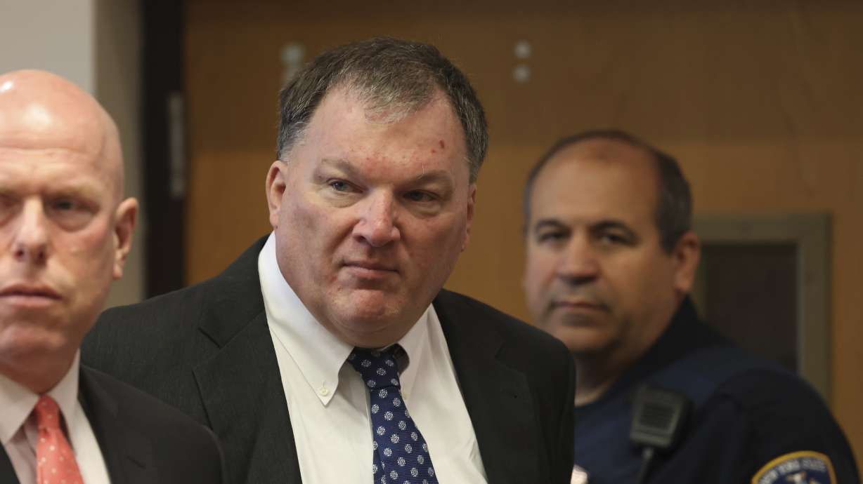 Rex Heuermann, center, charged in the Gilgo Beach serial killings on Long Island, appears for a hearing, July 30, at Suffolk County Court in Riverhead, N.Y. He has been charged in the death of a seventh woman Tuesday.