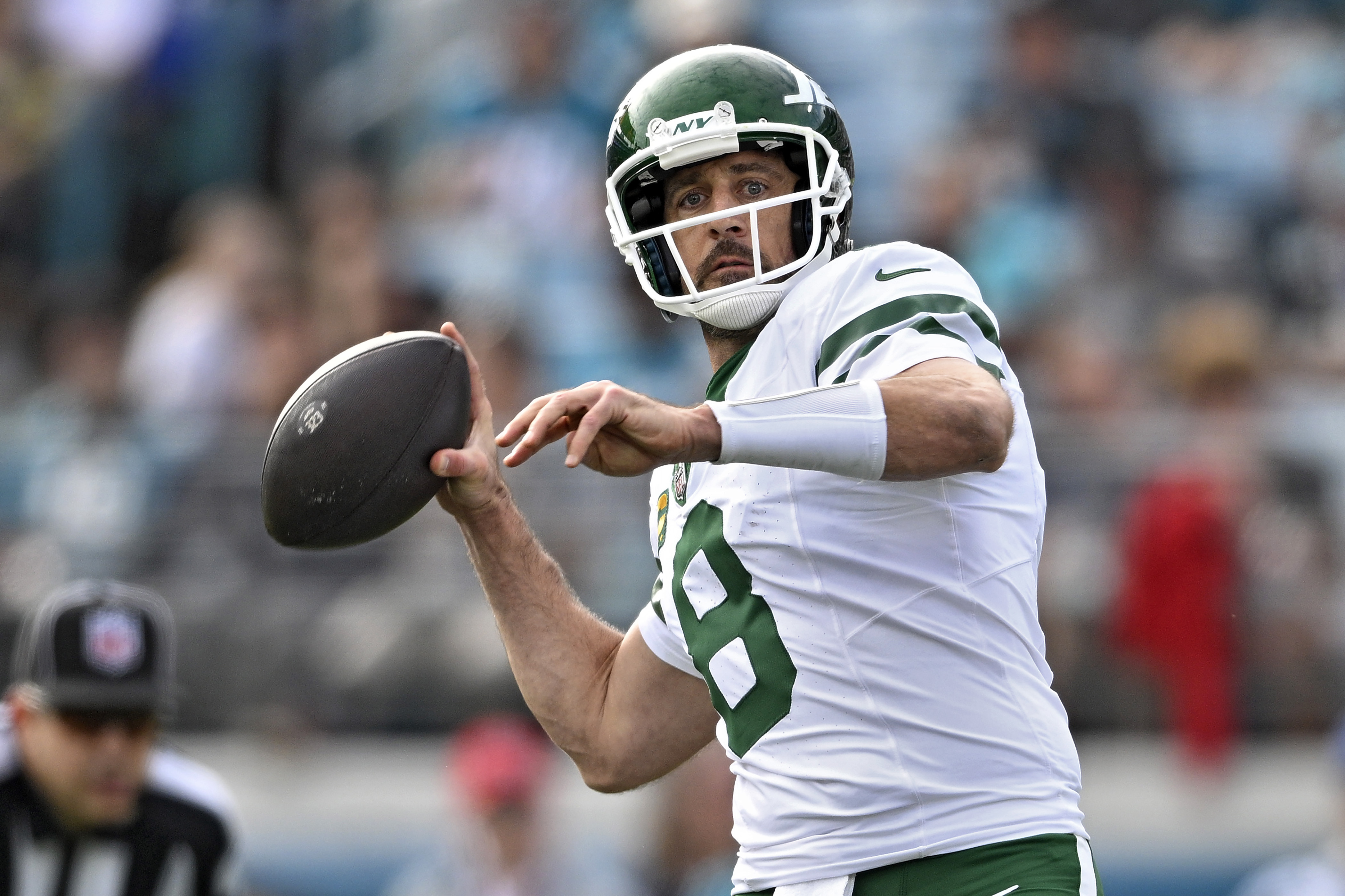New York Jets quarterback Aaron Rodgers (8) throws a pass against the Jacksonville Jaguars during the second half of an NFL football game Sunday, Dec. 15, 2024, in Jacksonville, Fla. 