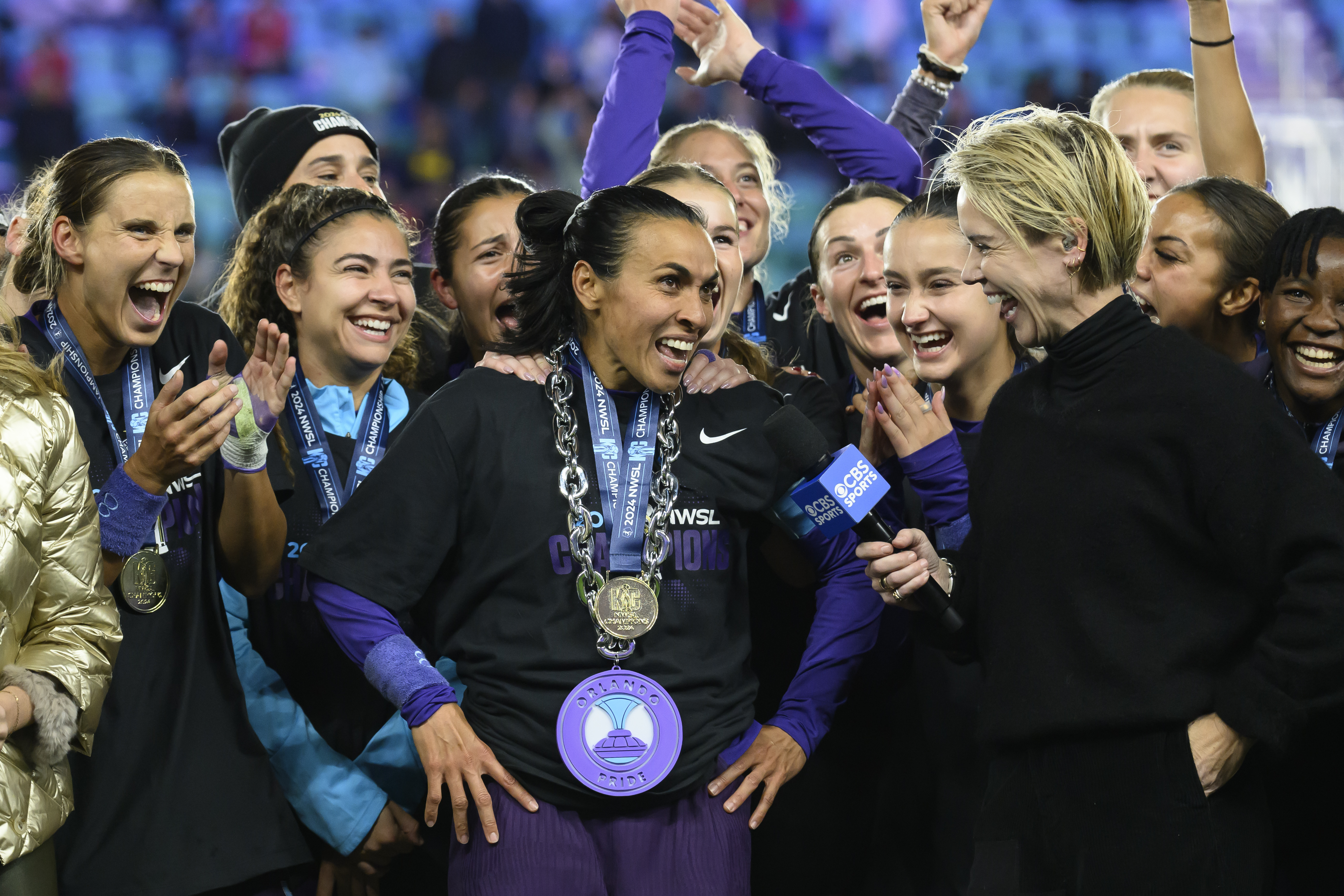 Orlando Pride forward Marta, center, is interviewed after their NWSL championship win over the Washington Spirit at CPKC Stadium, Saturday, Nov. 23, 2024, in Kansas City, Mo. 