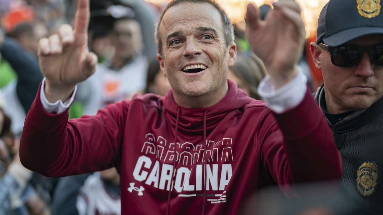 South Carolina head coach Shane Beamer celebrates after defeating Clemson in an NCAA college football game Saturday, Nov. 30, 2024, in Clemson, S.C.