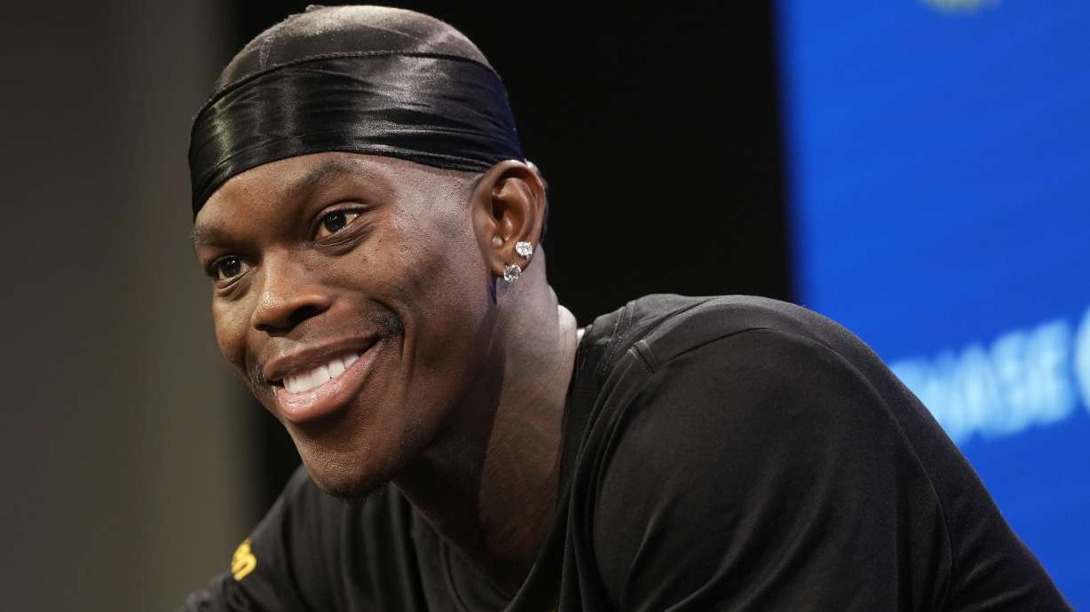 Golden State Warriors guard Dennis Schroder speaks at a news conference at the NBA basketball team's facility in San Francisco, Tuesday, Dec. 17, 2024.