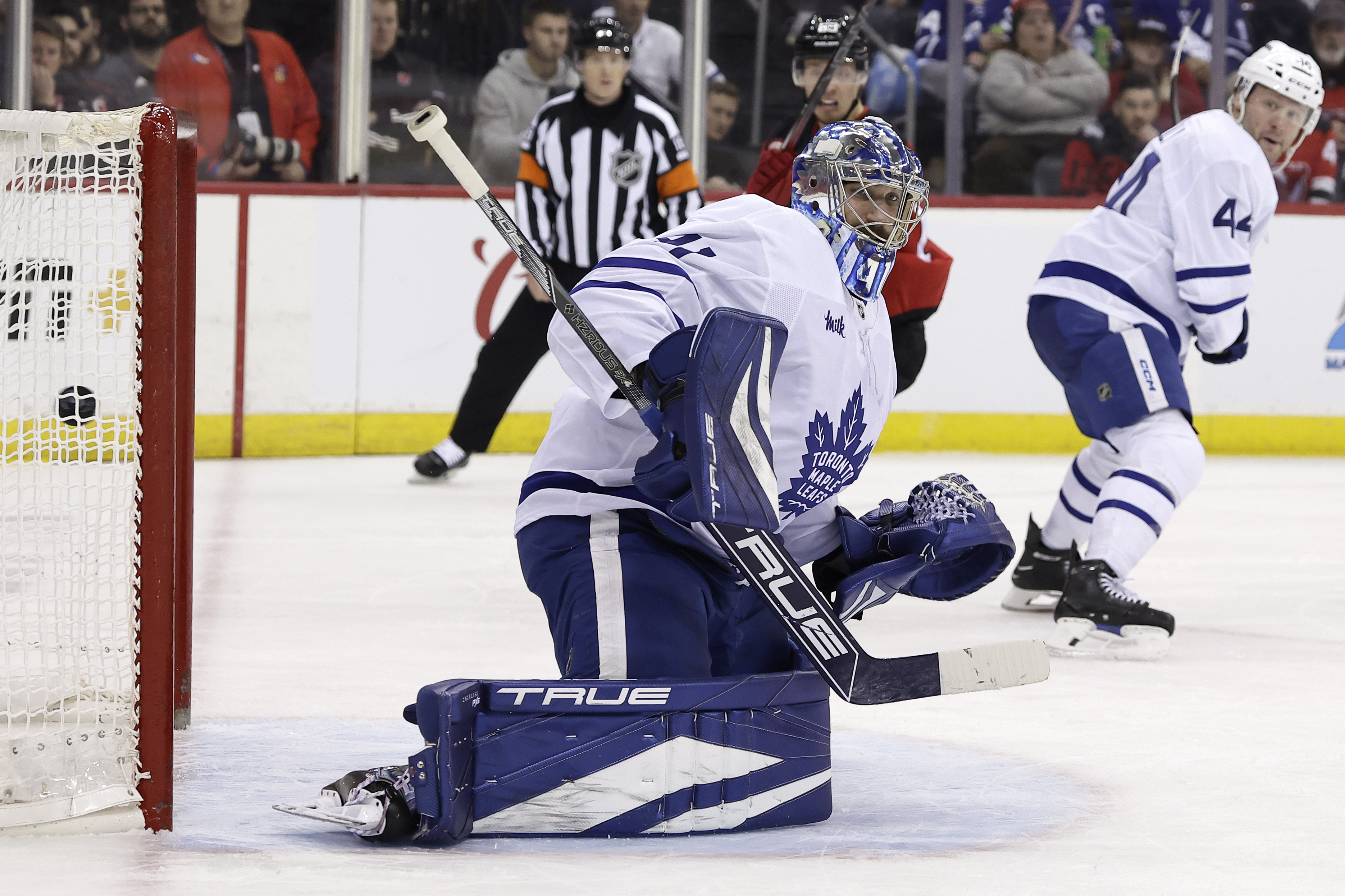 Toronto Maple Leafs goaltender Anthony Stolarz looks back at a goal scored by New Jersey Devils left wing Ondrej Palat during the second period of an NHL hockey game Tuesday, Dec. 10, 2024, in Newark, N.J. 