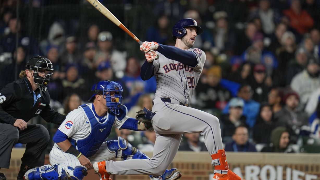 FILE - Houston Astros' Kyle Tucker watches his single during the fifth inning of the team's baseball game against the Chicago Cubs, Wednesday, April 24, 2024, in Chicago.
