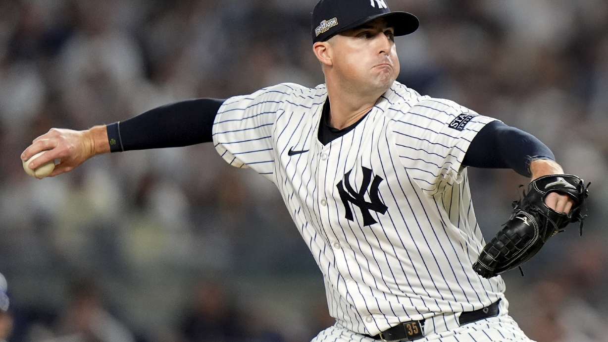 FILE -New York Yankees pitcher Clay Holmes delivers against the Kansas City Royals during the sixth inning of Game 1 of the American League baseball division series, Saturday, Oct. 5, 2024, in New York.
