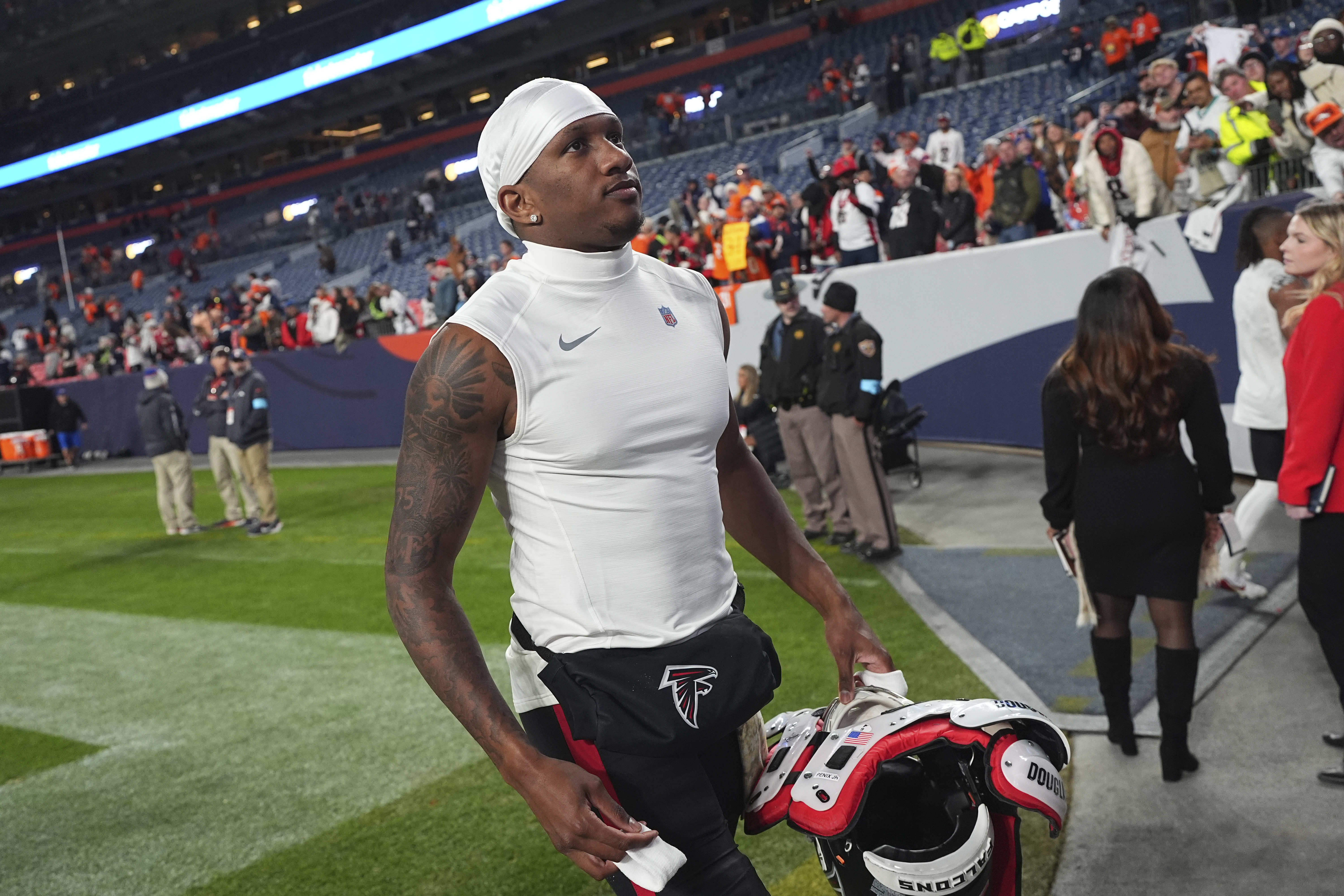 Atlanta Falcons quarterback Michael Penix Jr. heads off the field after an NFL football game, Sunday, Nov. 17, 2024, in Denver. 