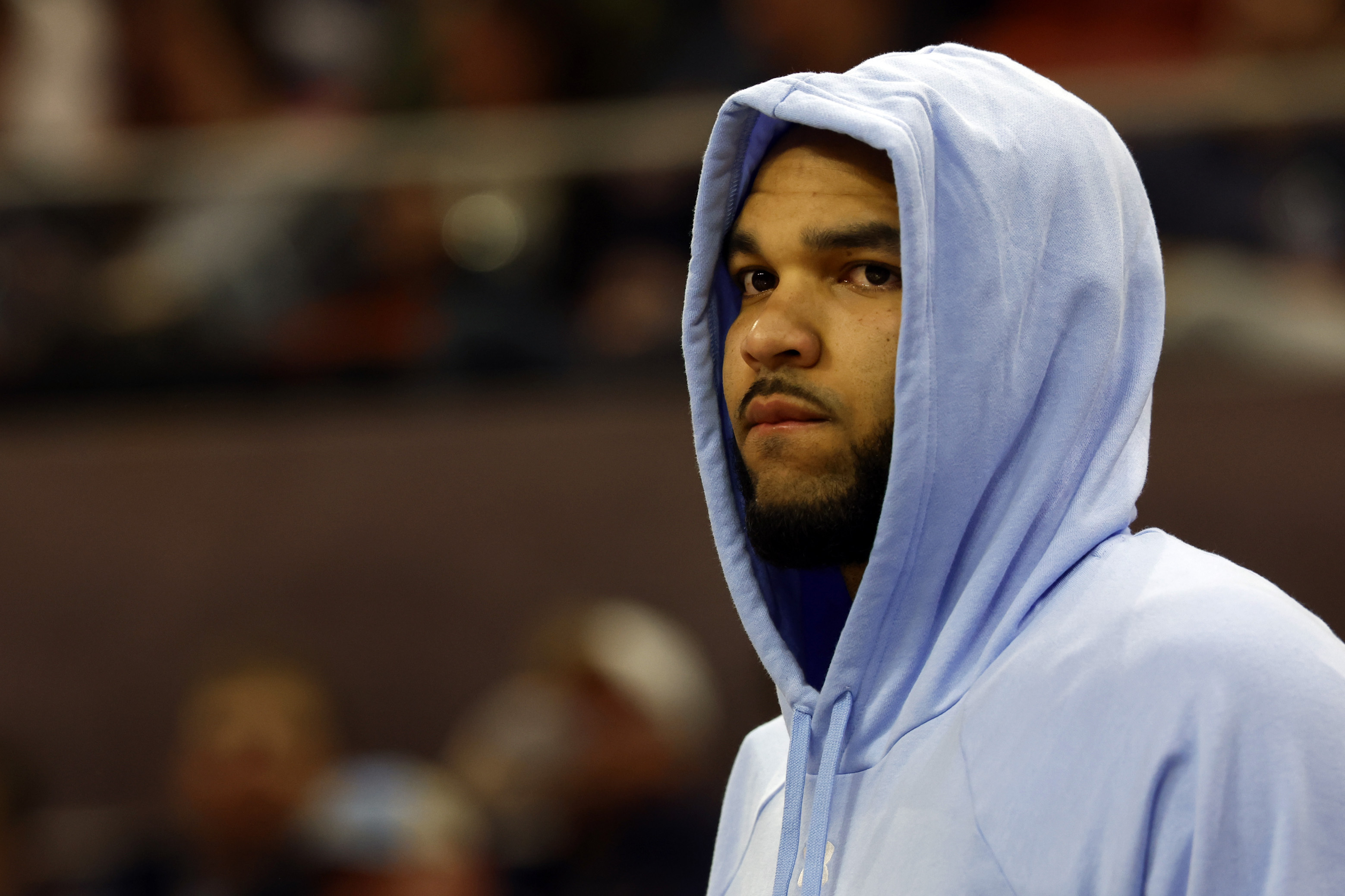 Auburn forward Johni Broome sits on the bench after sustaining an injury during the first half of an NCAA college basketball game against Georgia State, Tuesday, Dec. 17, 2024, in Auburn, Ala.