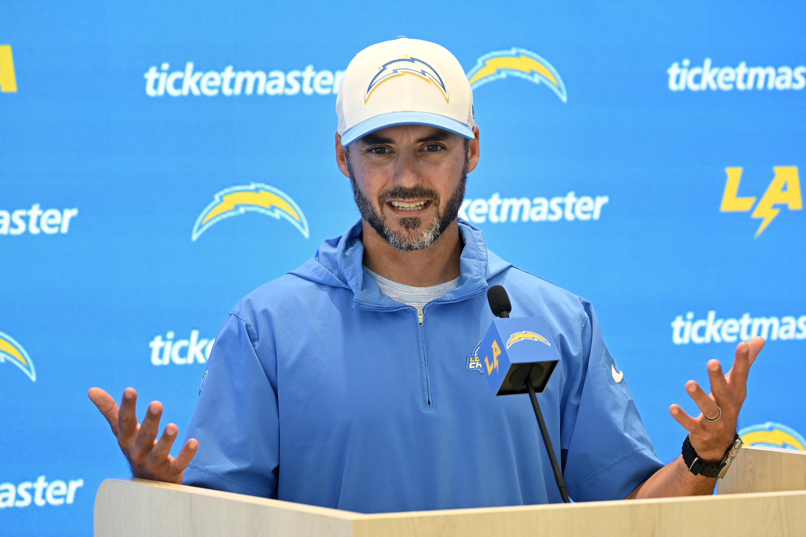FILE -Los Angeles Chargers defensive coordinator Jesse Minter speaks at a news conference during NFL football training camp Friday, July 26, 2024, in El Segundo, Calif. 
