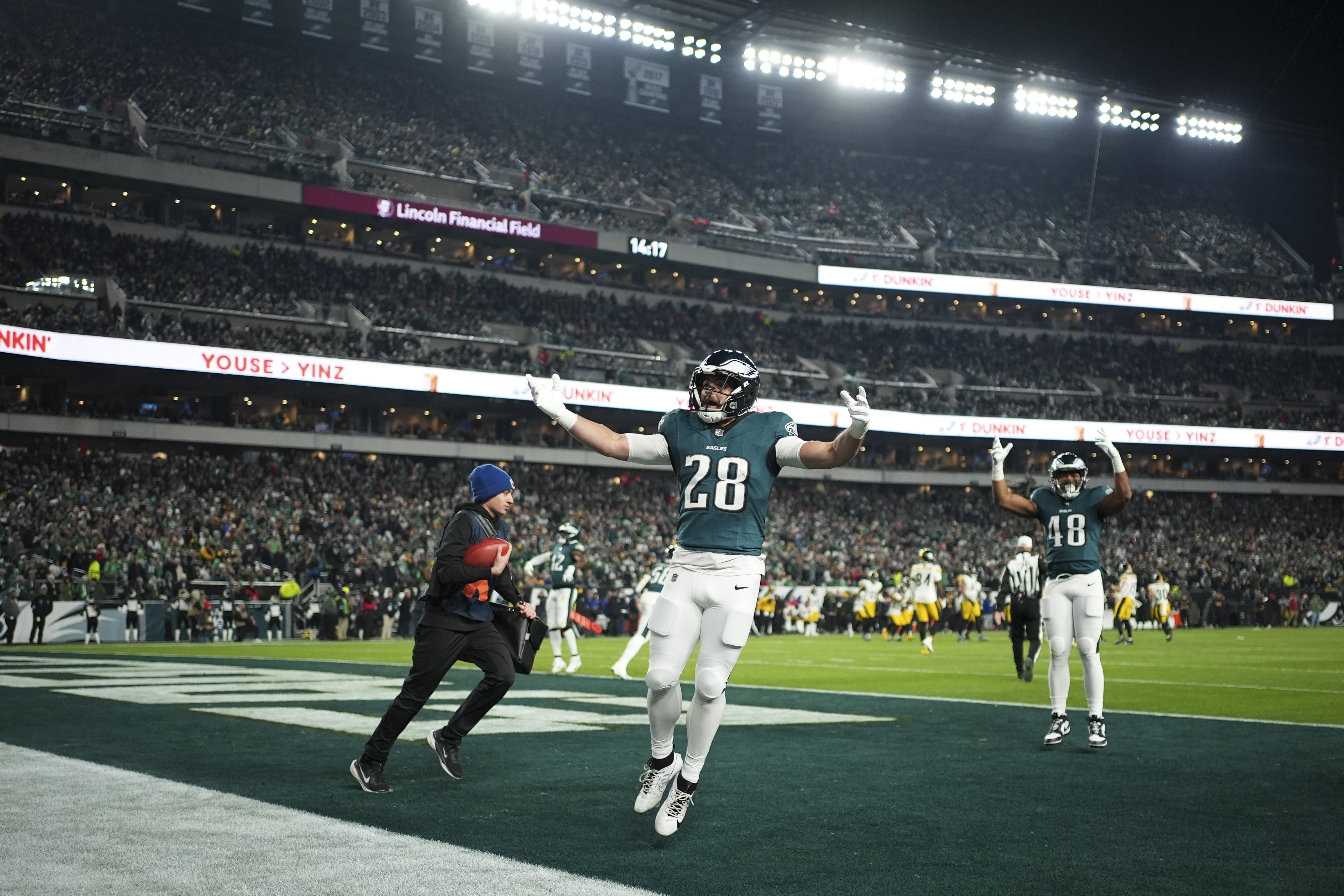 Philadelphia Eagles running back Will Shipley (28) gestures to the crowd with Eagles fullback Khari Blasingame (48) during the second half of an NFL football game against the Pittsburgh Steelers on Sunday, Dec. 15, 2024, in Philadelphia. 