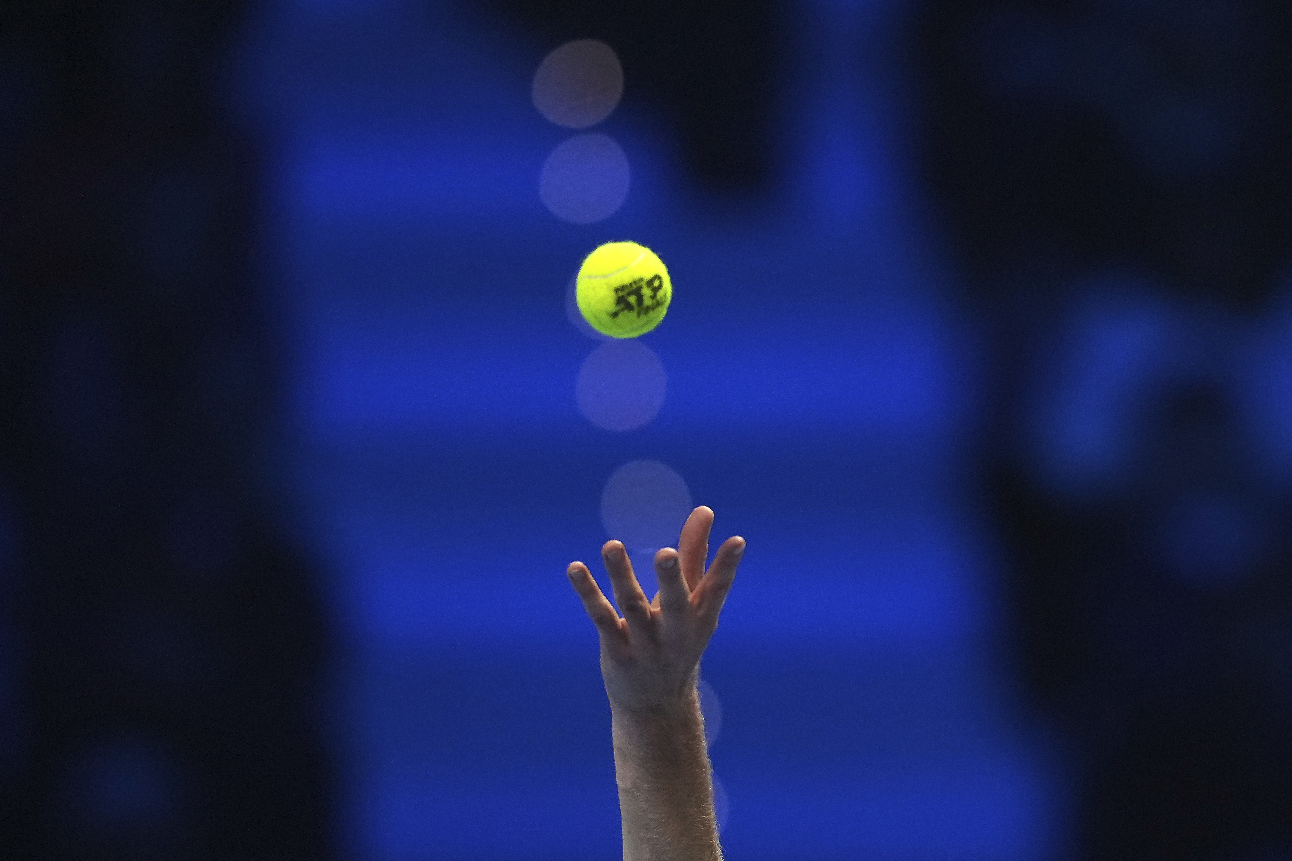 FILE- Italy's Jannik Sinner serves the ball to Russia's Daniil Medvedev during their singles tennis match of the ATP World Tour Finals at the Inalpi Arena, in Turin, Italy, Thursday, Nov. 14, 2024.