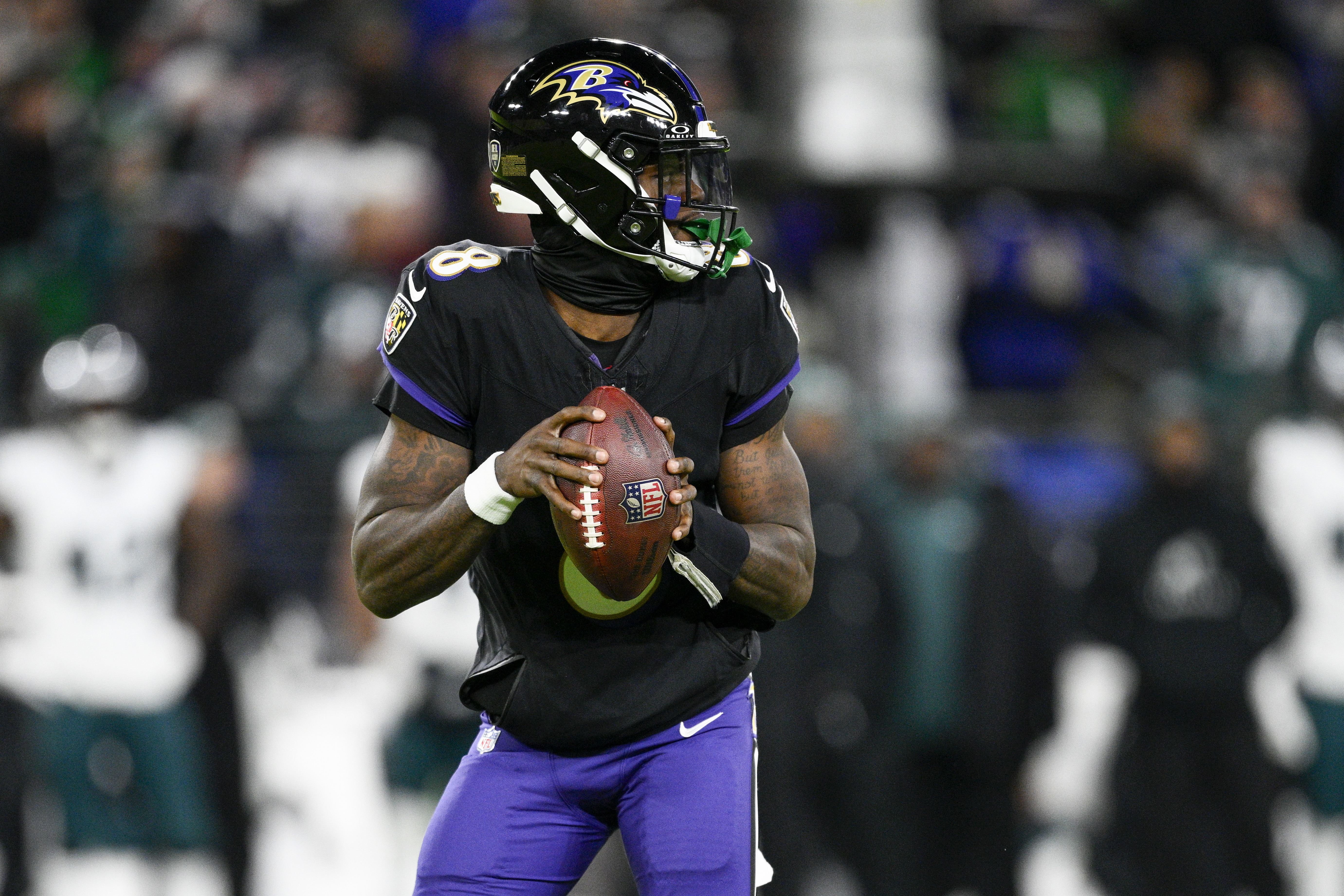 Baltimore Ravens quarterback Lamar Jackson looks to pass against the Philadelphia Eagles during the first half of an NFL football game, Sunday, Dec. 1, 2024, in Baltimore. 