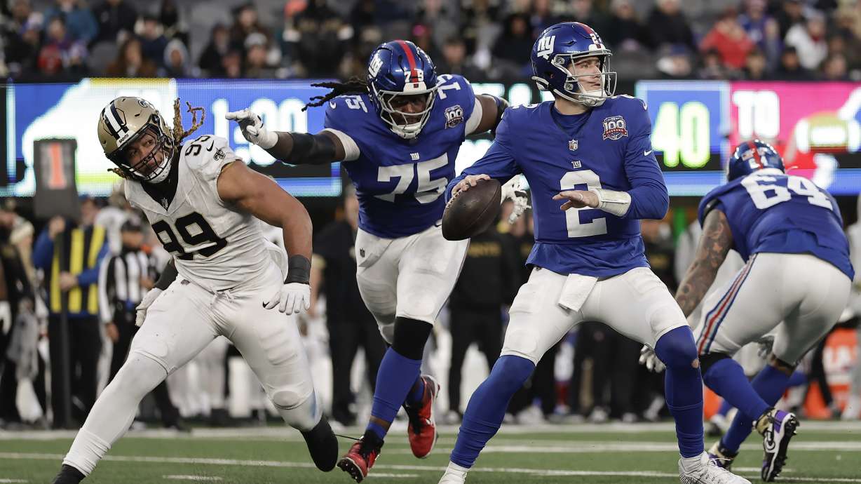 New York Giants quarterback Drew Lock (2) passes against the New Orleans Saints during the fourth quarter of an NFL football game, Sunday, Dec. 8, 2024, in East Rutherford, N.J.