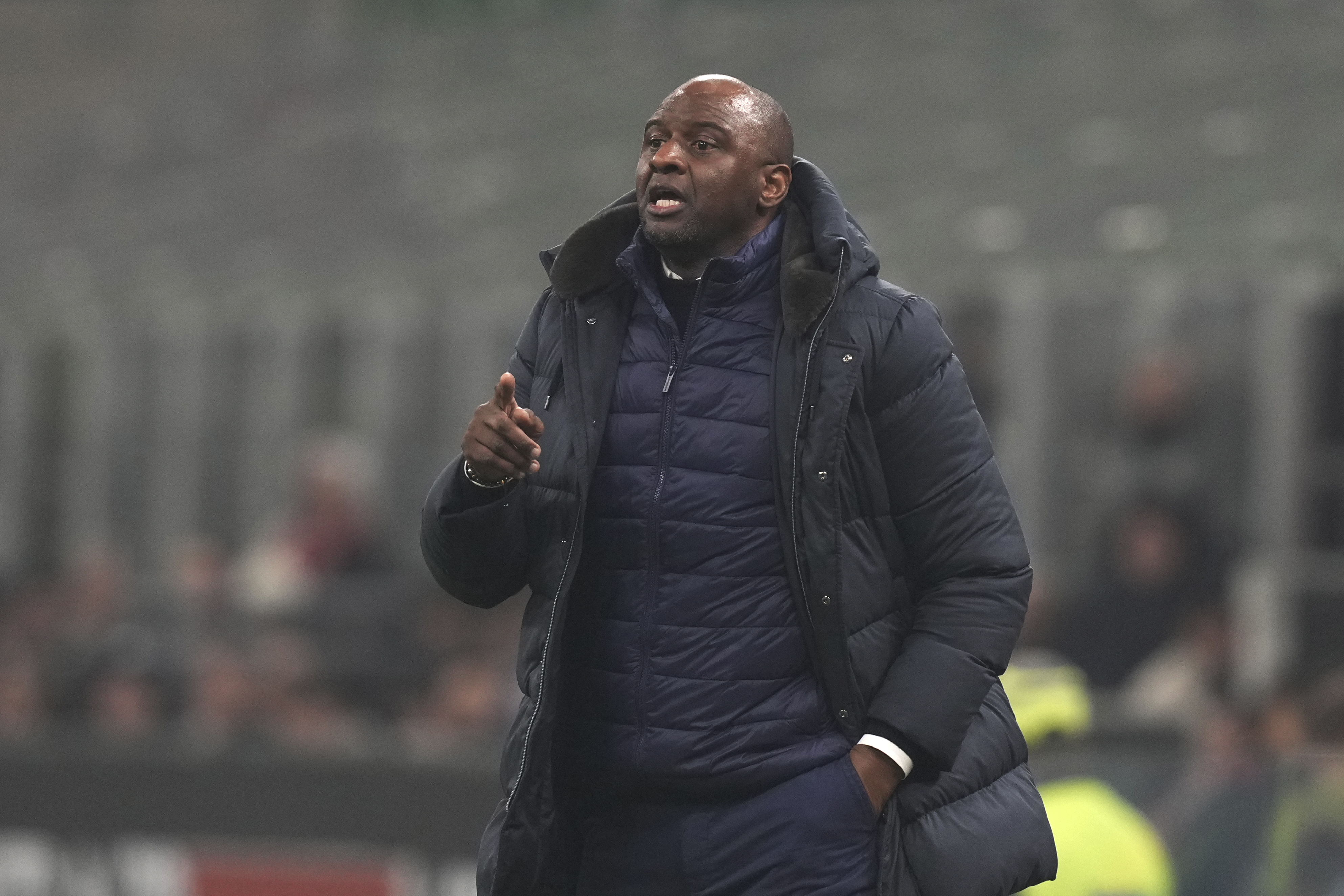 Genoa's coach Patrick Vieira eacts during the Serie A soccer match between AC Milan and Genoa at the San Siro stadium, in Milan, Italy, Sunday, Dec. 15, 2024.