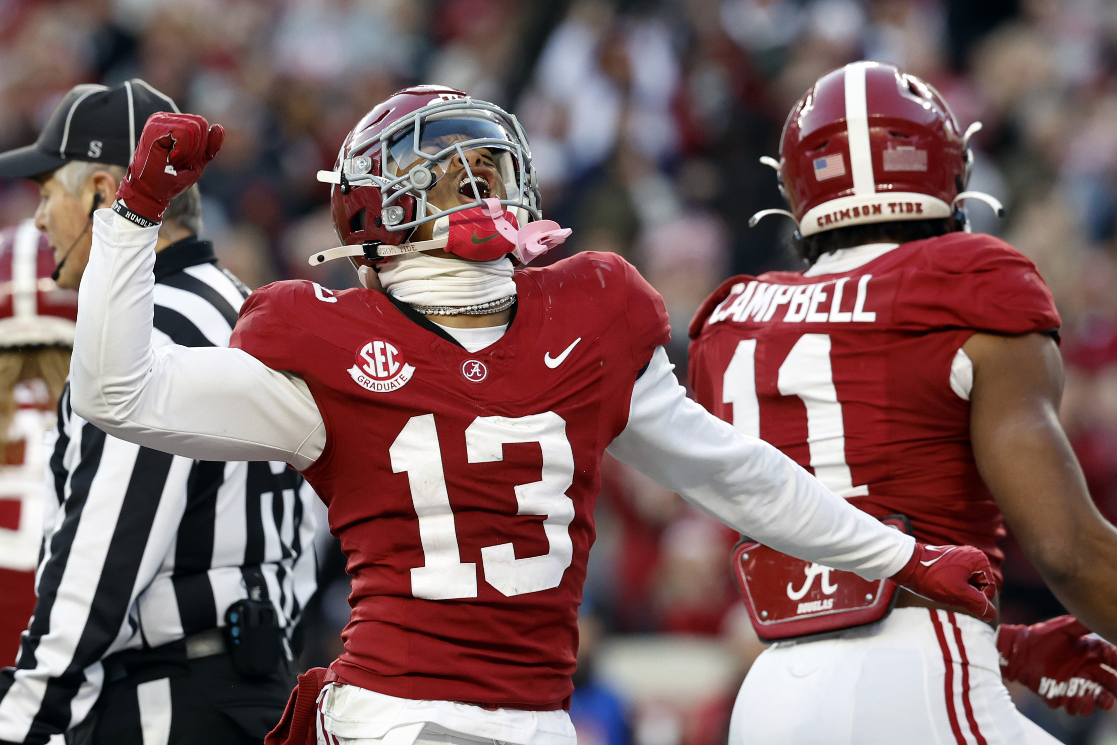 Alabama defensive back Malachi Moore (13) reacts after a defensive play against Auburn during the first half of an NCAA college football game, Saturday, Nov. 30, 2024, in Tuscaloosa, Ala.