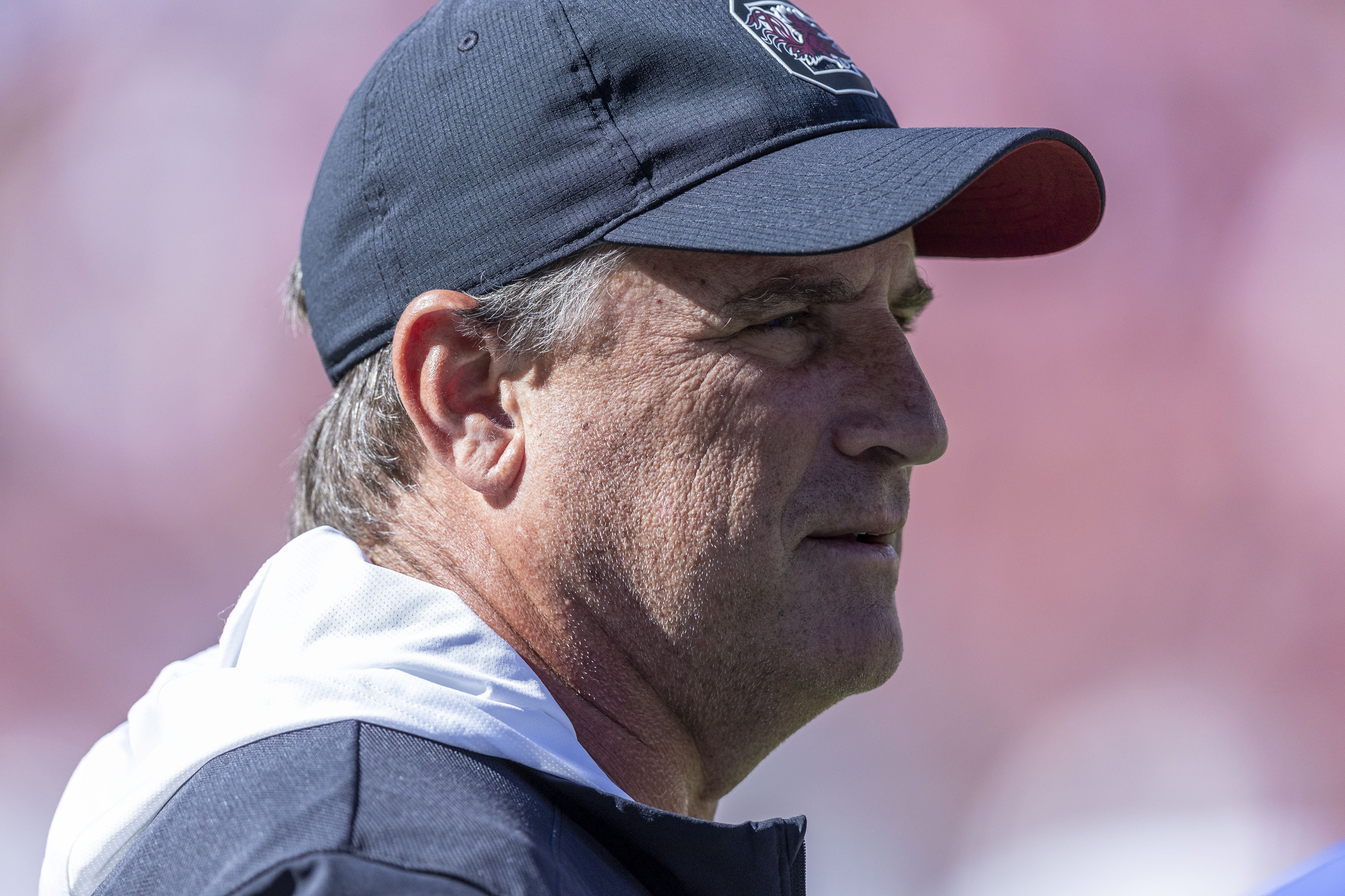 FILE - South Carolina offensive analyst Mike Shula walks the field during warm-ups before an NCAA college football game against Alabama, Saturday, Oct. 12, 2024, in Tuscaloosa, Ala. 