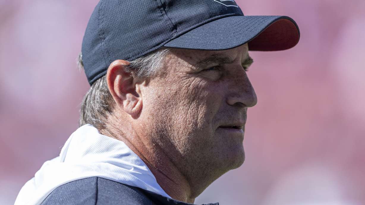 FILE - South Carolina offensive analyst Mike Shula walks the field during warm-ups before an NCAA college football game against Alabama, Saturday, Oct. 12, 2024, in Tuscaloosa, Ala.