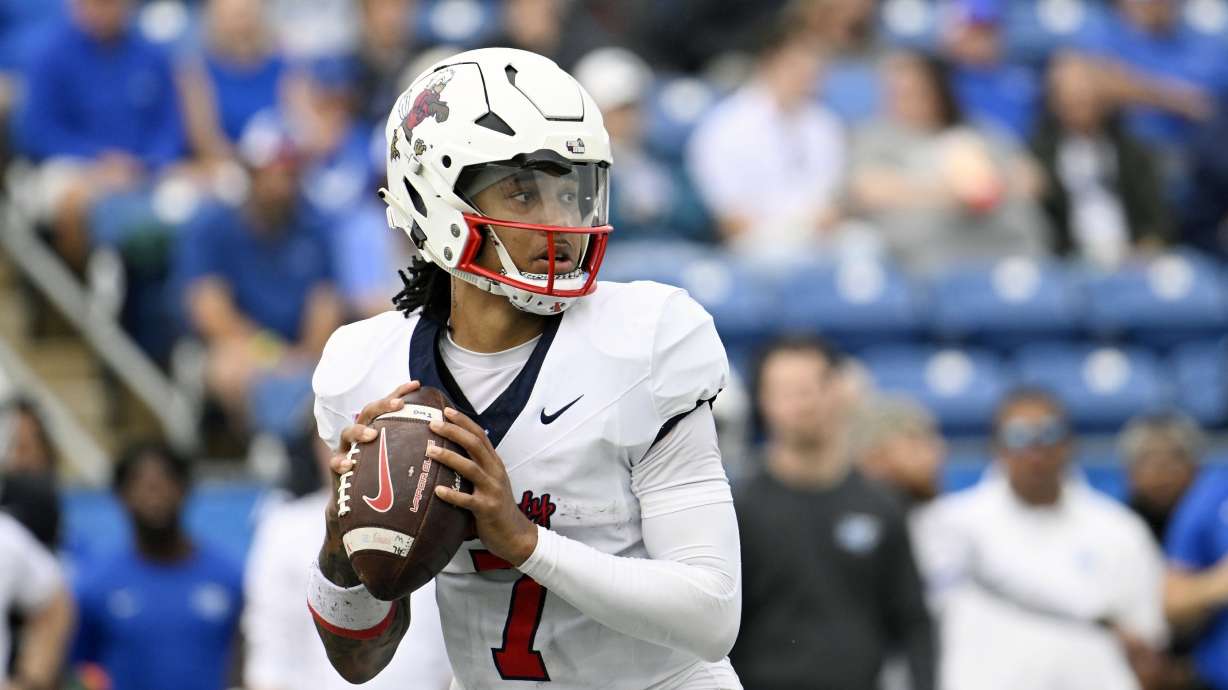 FILE - Liberty quarterback Kaidon Salter (7)plays against Middle Tennessee during an NCAA football game on Saturday, Nov. 9, 2024, in Murfreesboro, Tenn.