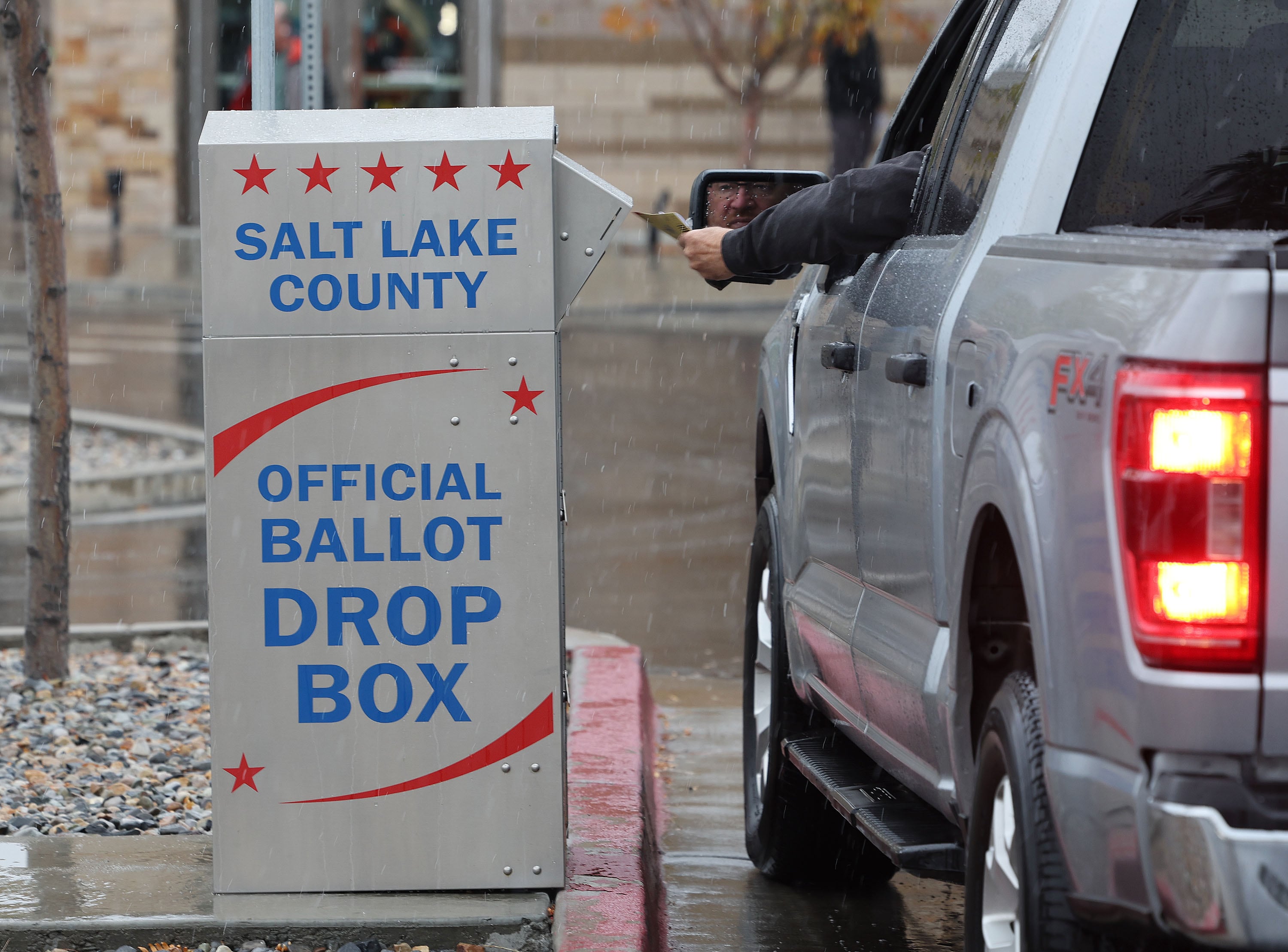 A ballot is dropped off at City Hall in Cottonwood Heights on Nov. 5.