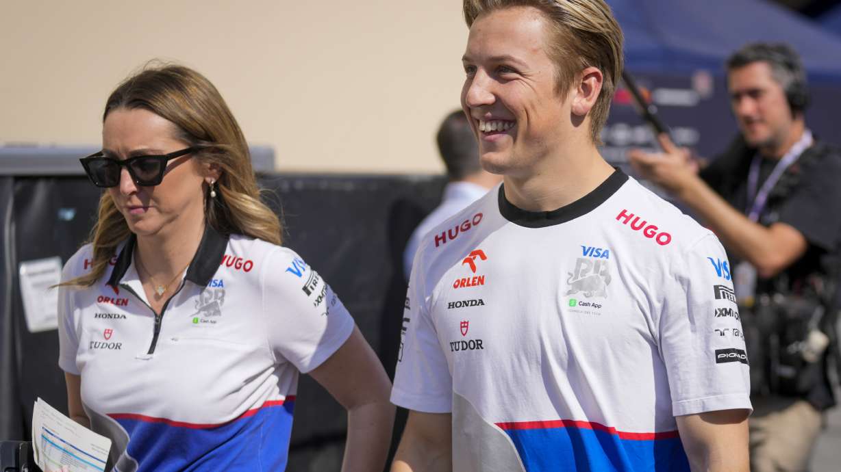 RB driver Liam Lawson of New Zealand walks through paddock ahead of the Formula One Abu Dhabi Grand Prix, at the Yas Marina Circuit in Abu Dhabi, UAE, Thursday, Dec. 5, 2024.