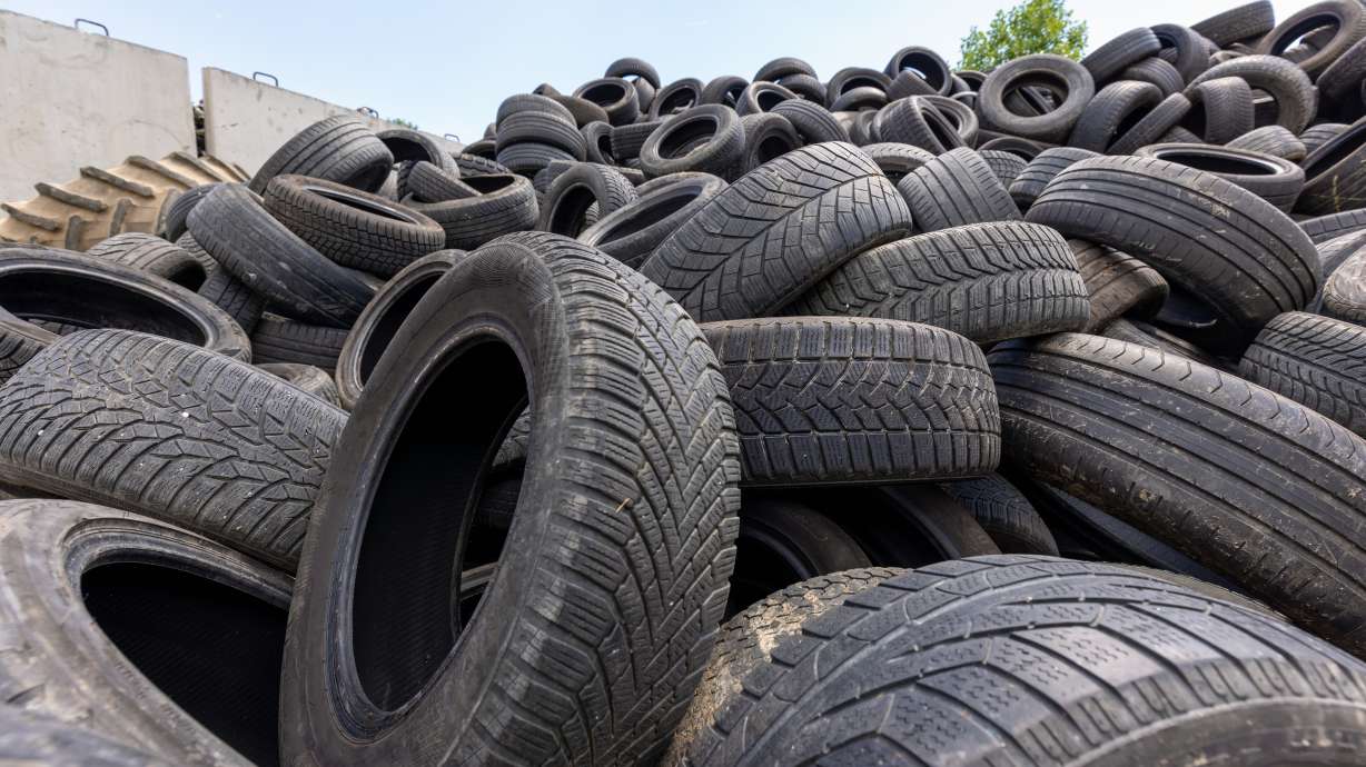 Unified police arrested a man Thursday in connection with an investigation involving more than 10,000 tires being illegally dumped around Salt Lake County.