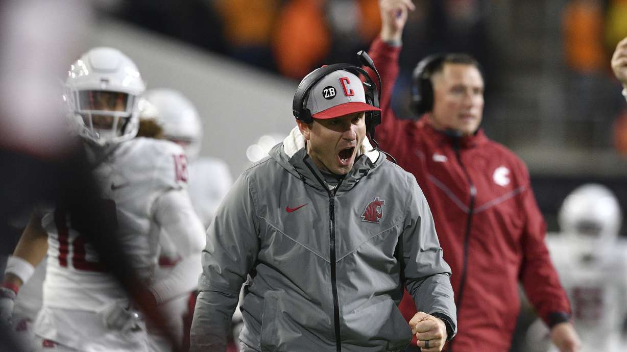 FILE - Washington State head coach Jake Dickert reacts to a touchdown against Oregon State during the second half of an NCAA college football game Saturday, Nov. 23, 2024, in Corvallis, Ore. Oregon State won 41-38. (AP Photo/Mark Ylen, File0