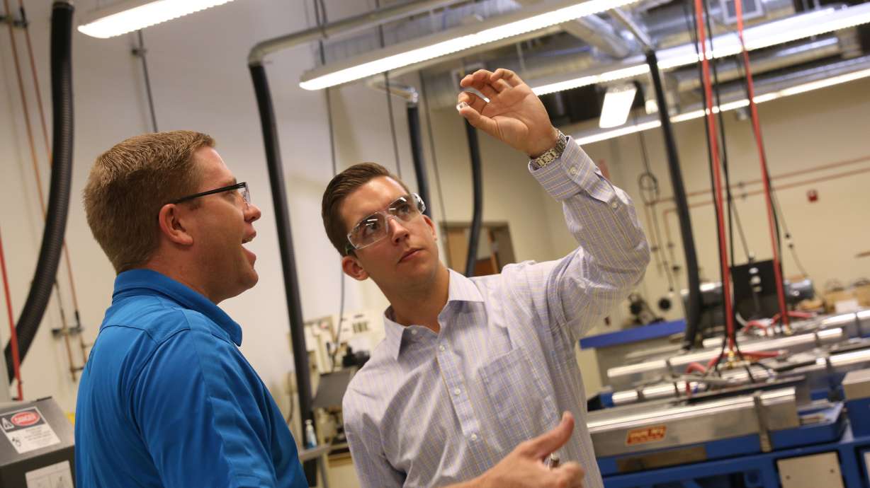 A University of Utah student consults with a worker as part of an assessment program. State lawmakers are calling for sharper workforce alignment between Utah higher education and industry.