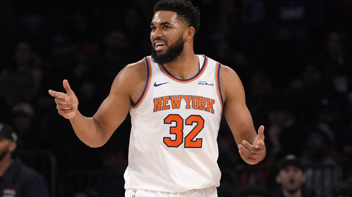 New York Knicks' Karl-Anthony Towns stands on the court during the first half of an NBA basketball game against the Charlotte Hornets, Thursday, Dec. 5, 2024, in New York.