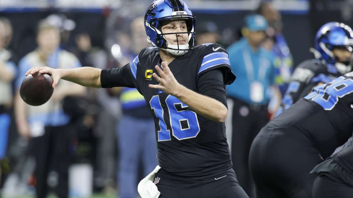 Detroit Lions quarterback Jared Goff (16) passes against the Buffalo Bills during the first half of an NFL football game, Sunday, Dec. 15, 2024, in Detroit.
