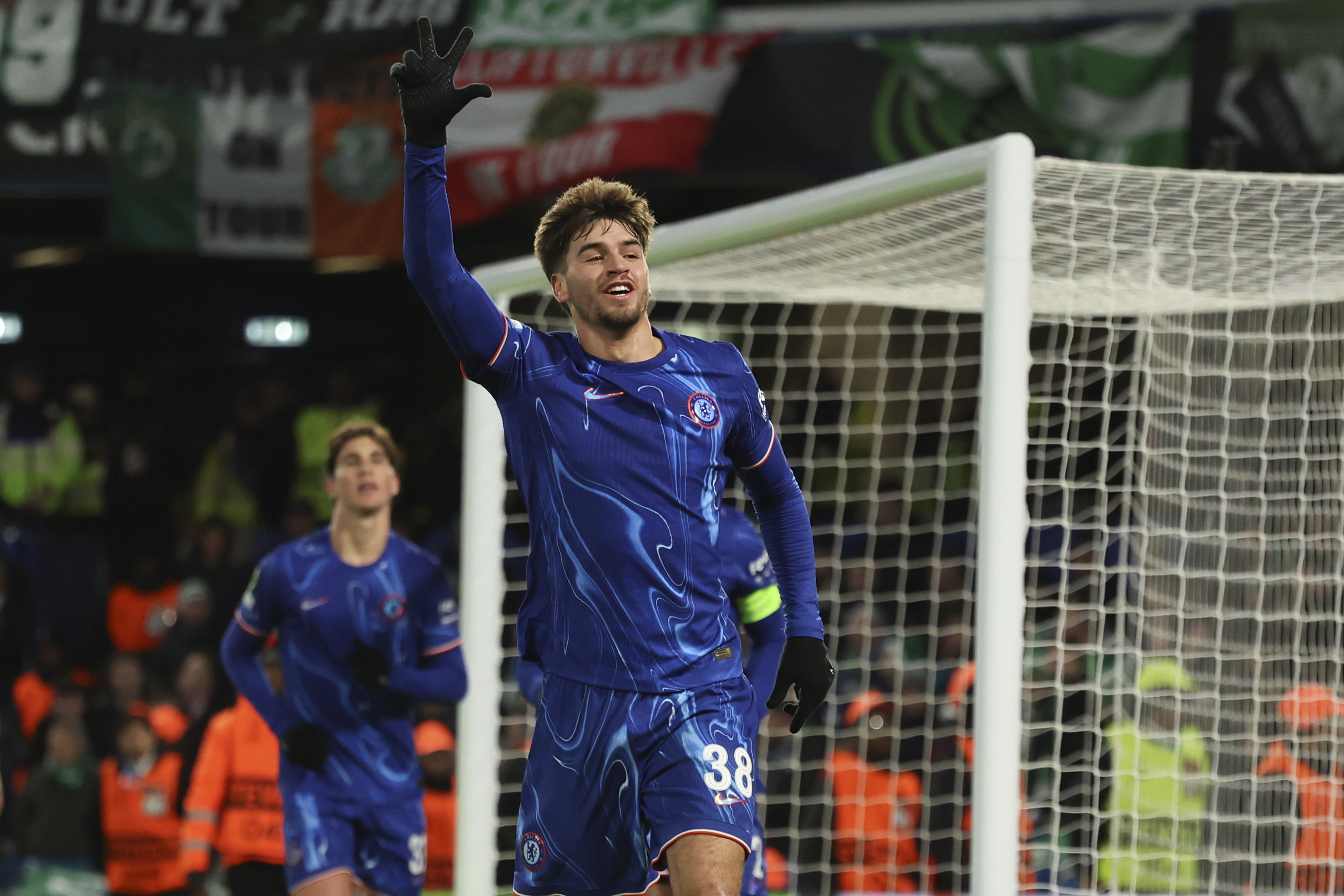 Chelsea's Marc Guiu celebrates scoring his side's 4th goal during the Europa Conference League opening phase soccer match between Chelsea and Shamrock Rovers at Stamford Bridge stadium in London, Thursday, Dec. 19, 2024.
