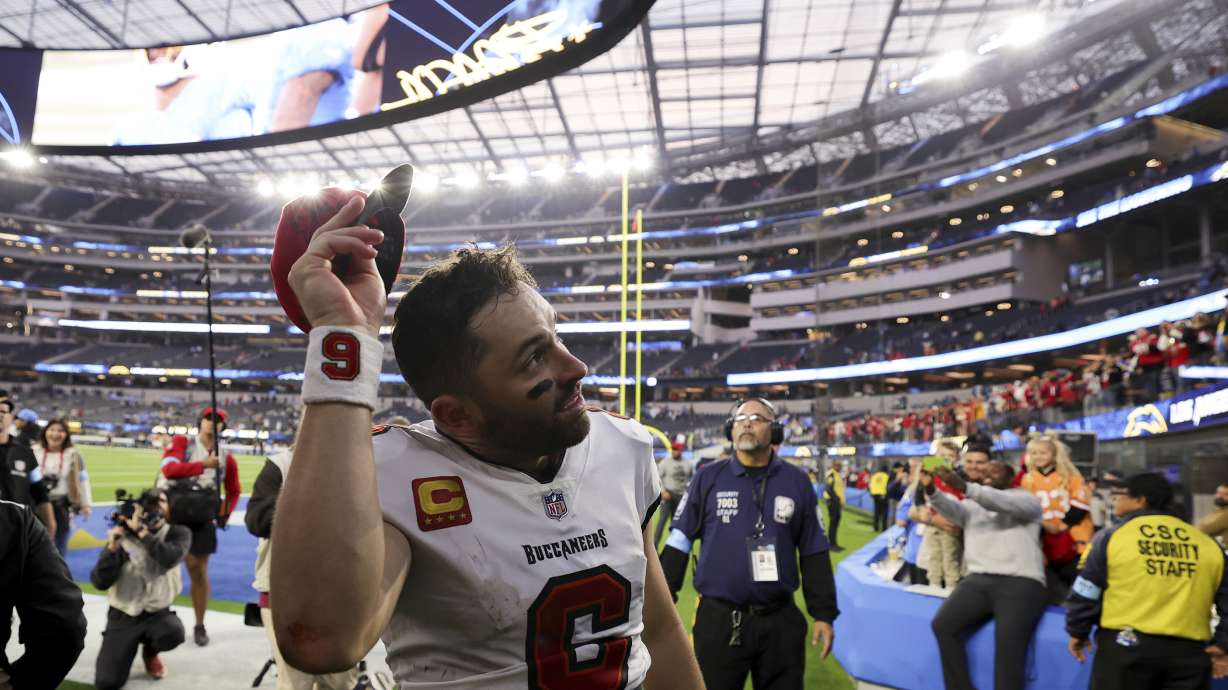 Tampa Bay Buccaneers quarterback Baker Mayfield walks off the field after a win over the Los Angeles Chargers in an NFL football game Sunday, Dec. 15, 2024, in Inglewood, Calif.