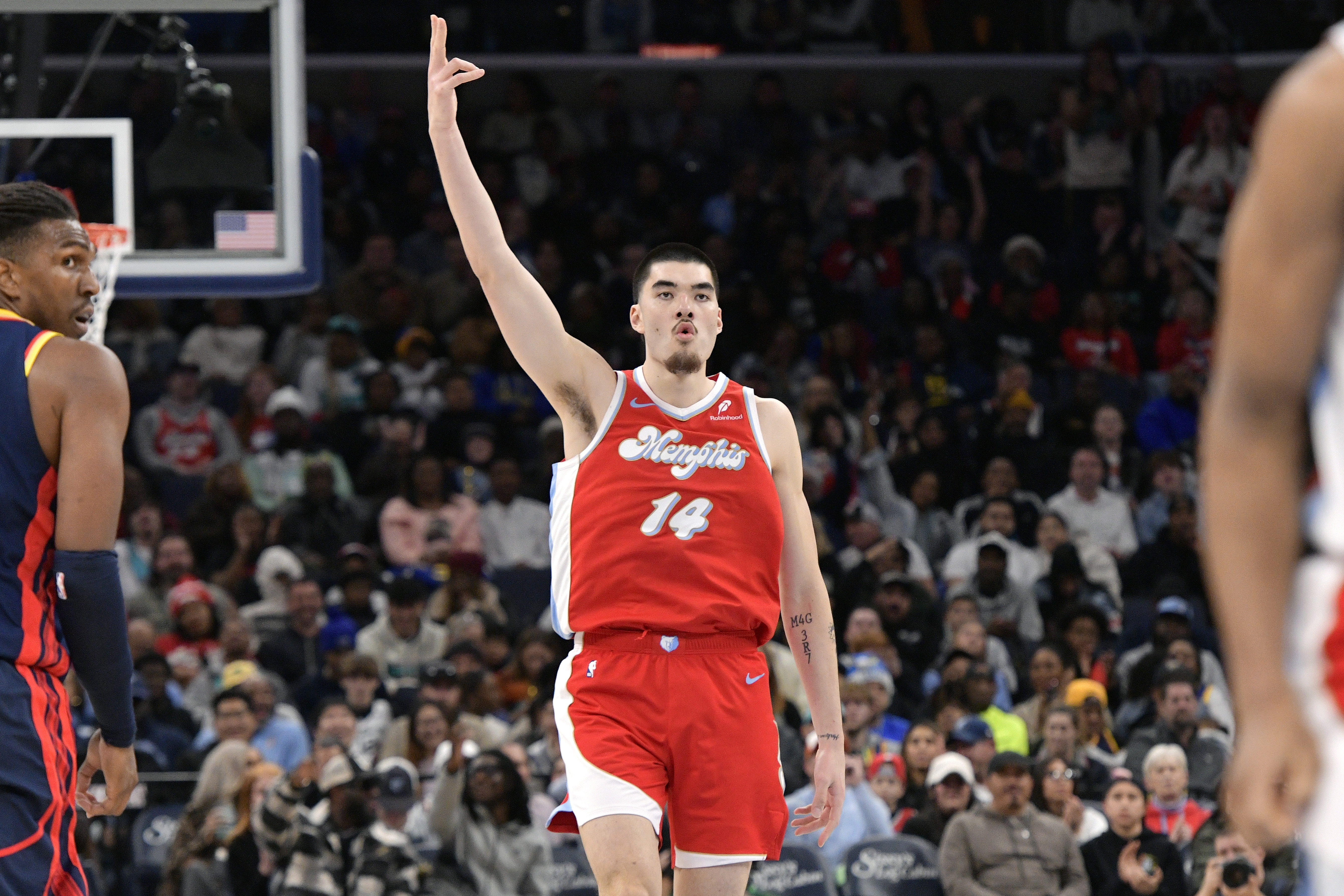 Memphis Grizzlies center Zach Edey (14) reacts in the second half of an NBA basketball game against the Golden State Warriors, Thursday, Dec. 19, 2024, in Memphis, Tenn. 