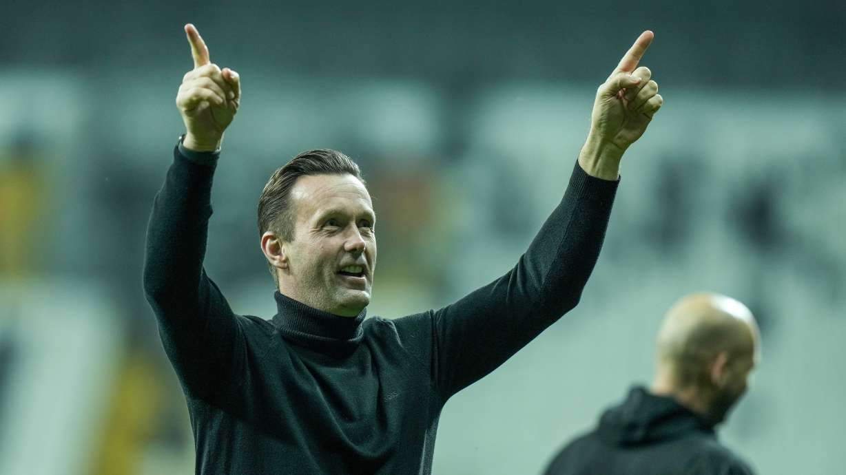 FILE - Brugge's head coach Ronny Deila celebrates at the end of the Europa Conference League group D soccer match between Besiktas and Club Brugge at Besiktas park stadium in Istanbul, Turkey, Thursday, Nov. 30, 2023. .