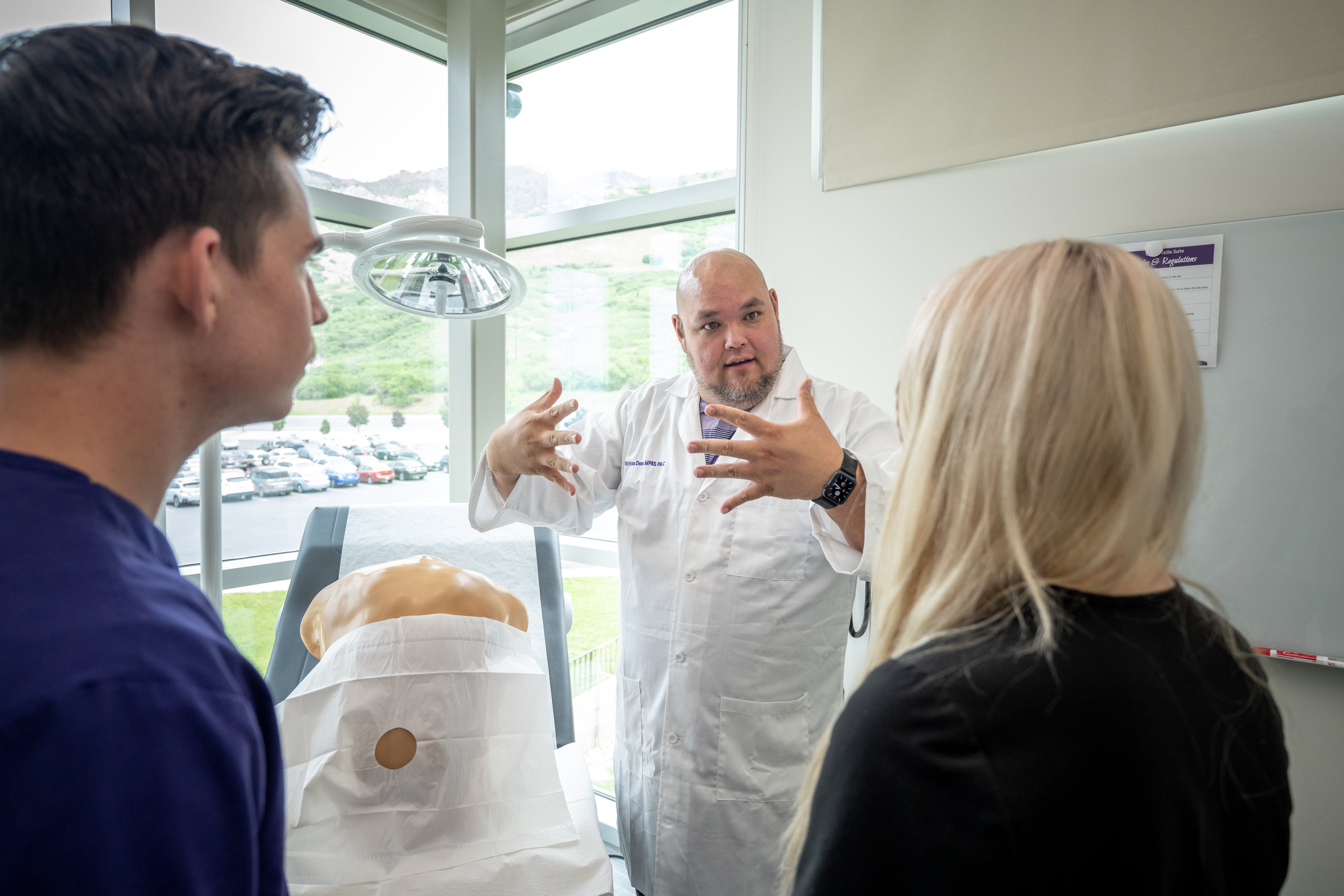 Weber State professor Nicholas Dean instructs physician assistant students in the first cohort of Weber State University’s new Physician Assistant program on Thursday, June 1, 2023.