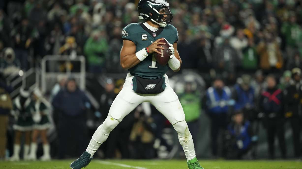 Philadelphia Eagles quarterback Jalen Hurts looks to pass during the first half of an NFL football game against the Pittsburgh Steelers on Sunday, Dec. 15, 2024, in Philadelphia.