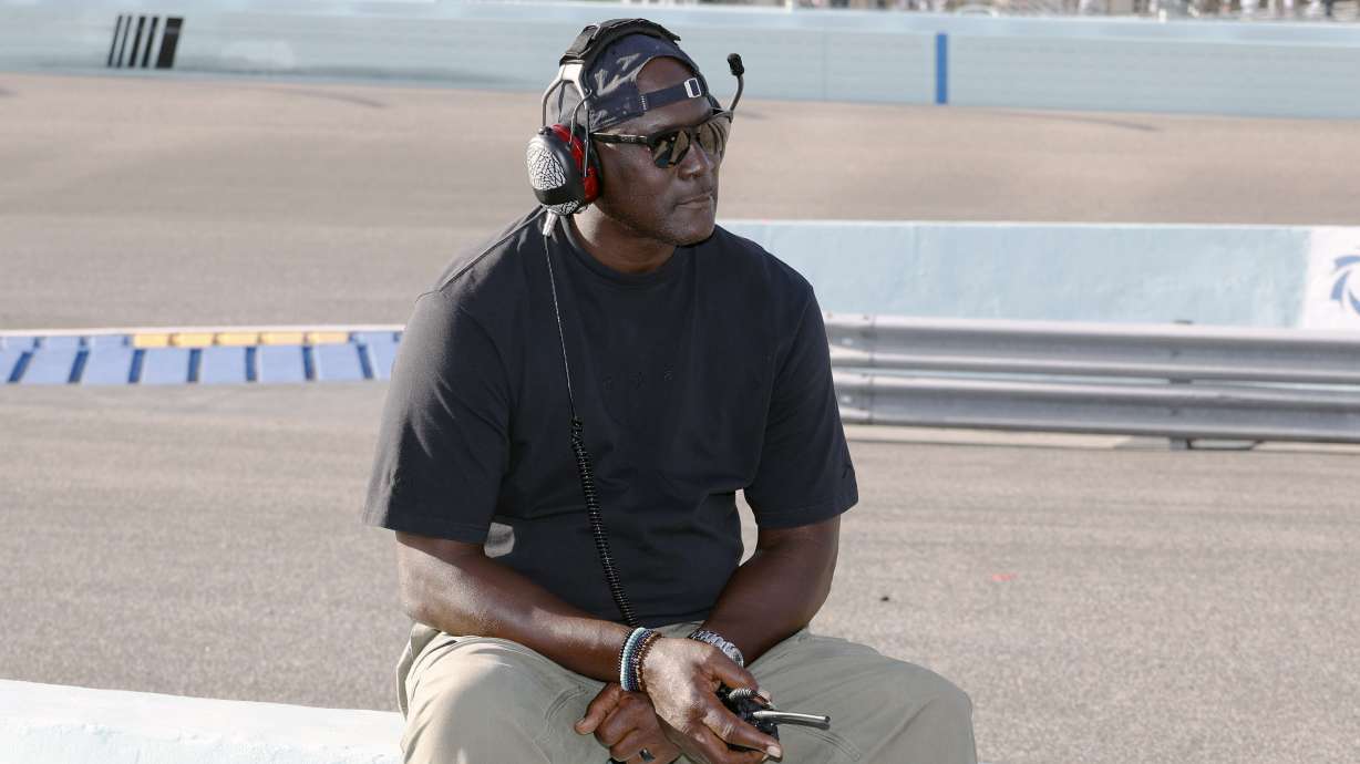 FILE - Car owner Michael Jordan watches from the pits during a NASCAR Cup Series auto race at Homestead-Miami Speedway in Homestead, Fla., Oct. 27, 2024.