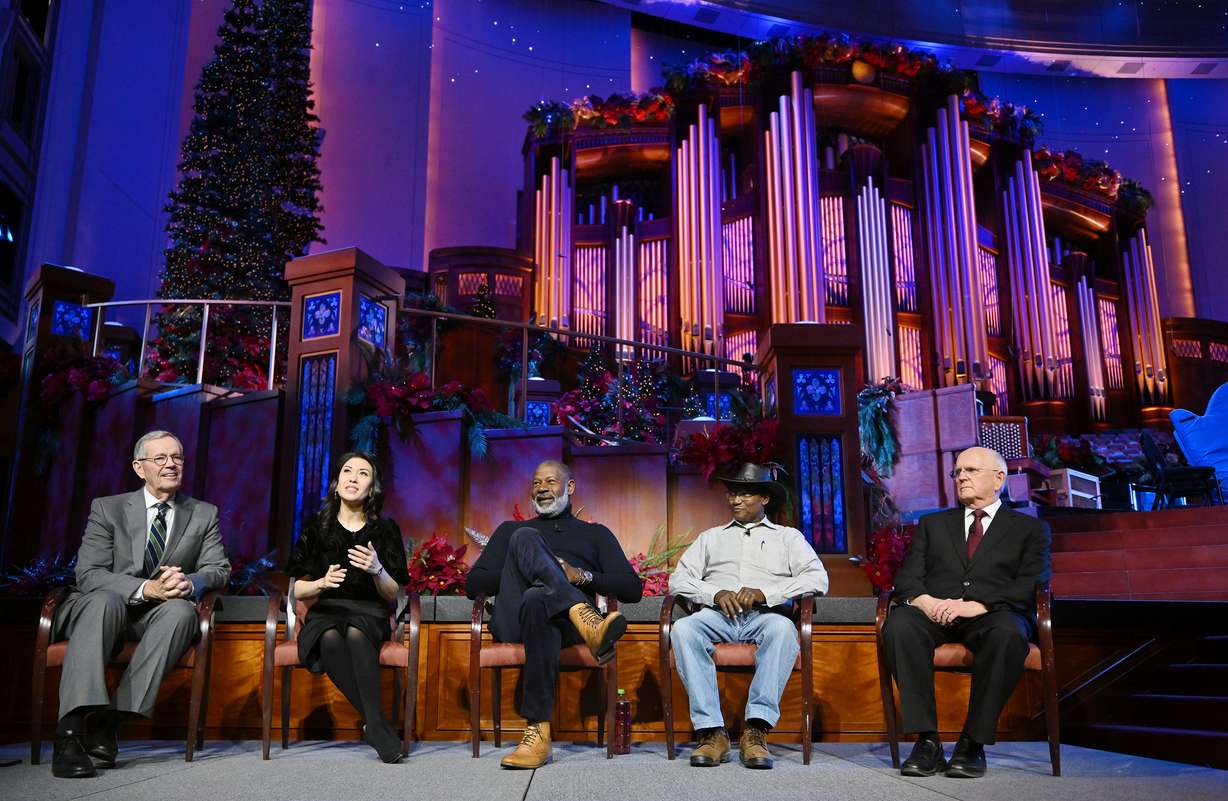 Mike Leavitt, president of the Tabernacle Choir at Temple Square and Mack Wilberg, choir music director, with Ruthie Ann Miles, Dennis Haysbert and Charles Mulli at the Conference Center in Salt Lake City on Friday.