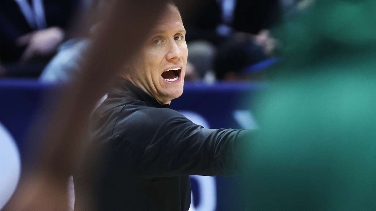 Brigham Young head coach Kevin Young calls a play in Provo on Friday, Dec. 20, 2024. BYU won 103-57.